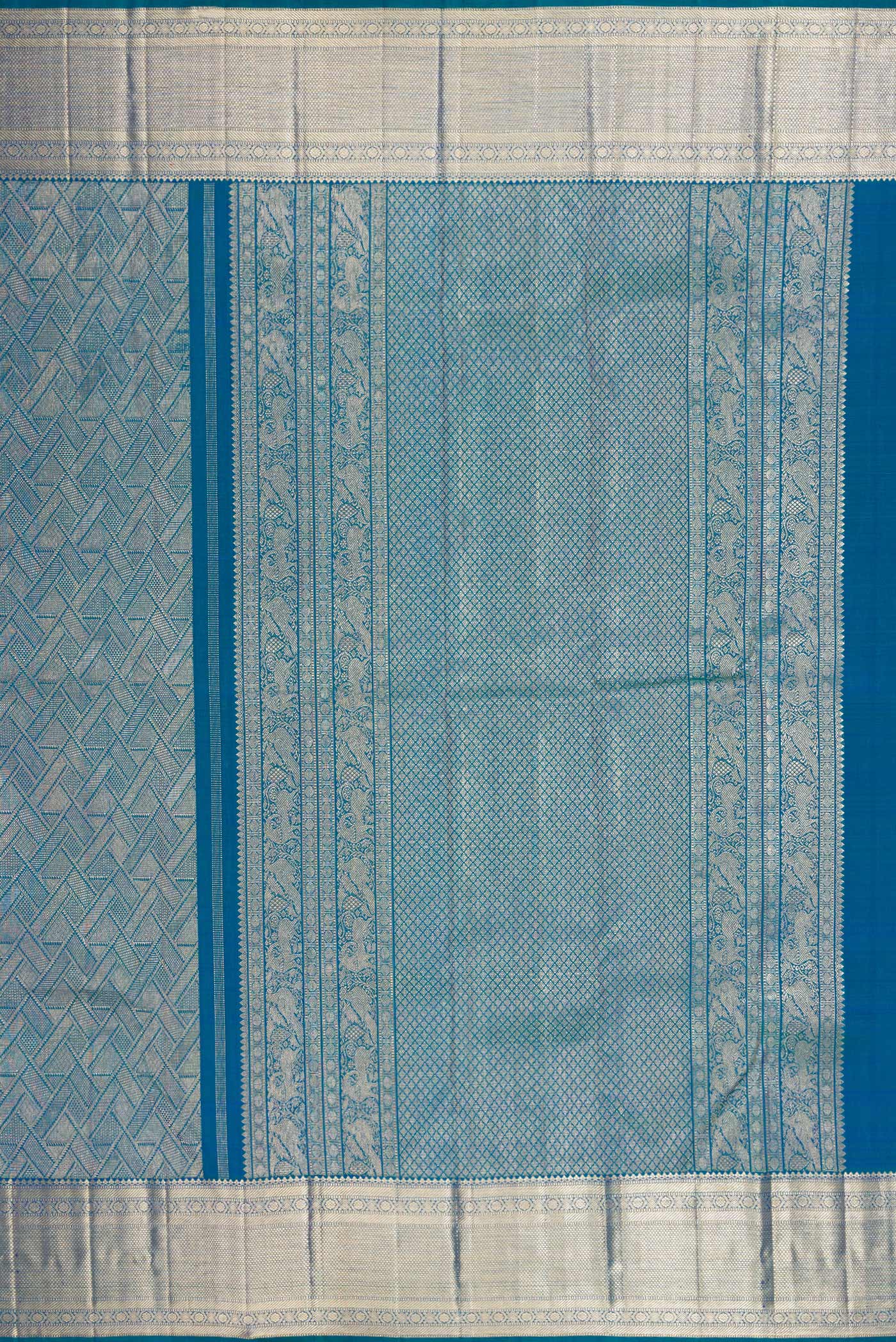 Close up image of the pallu of Peacock Blue Kanchipuram Silk Saree with Zari Brocade on the body and Fancy Border. 
