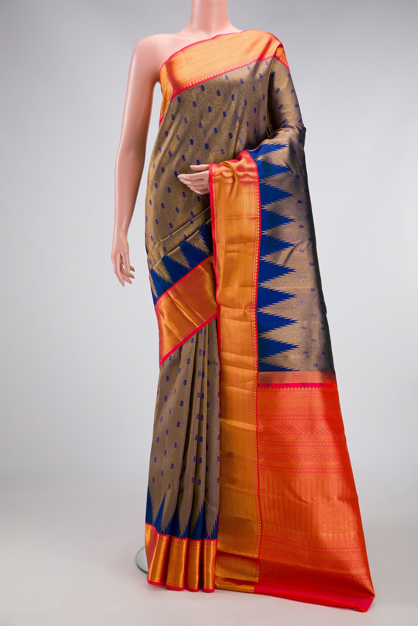 Peacock Blue Kanjivaram Silk Saree with Zari Brocade on the body and Zari Border.  displayed on a mannequin