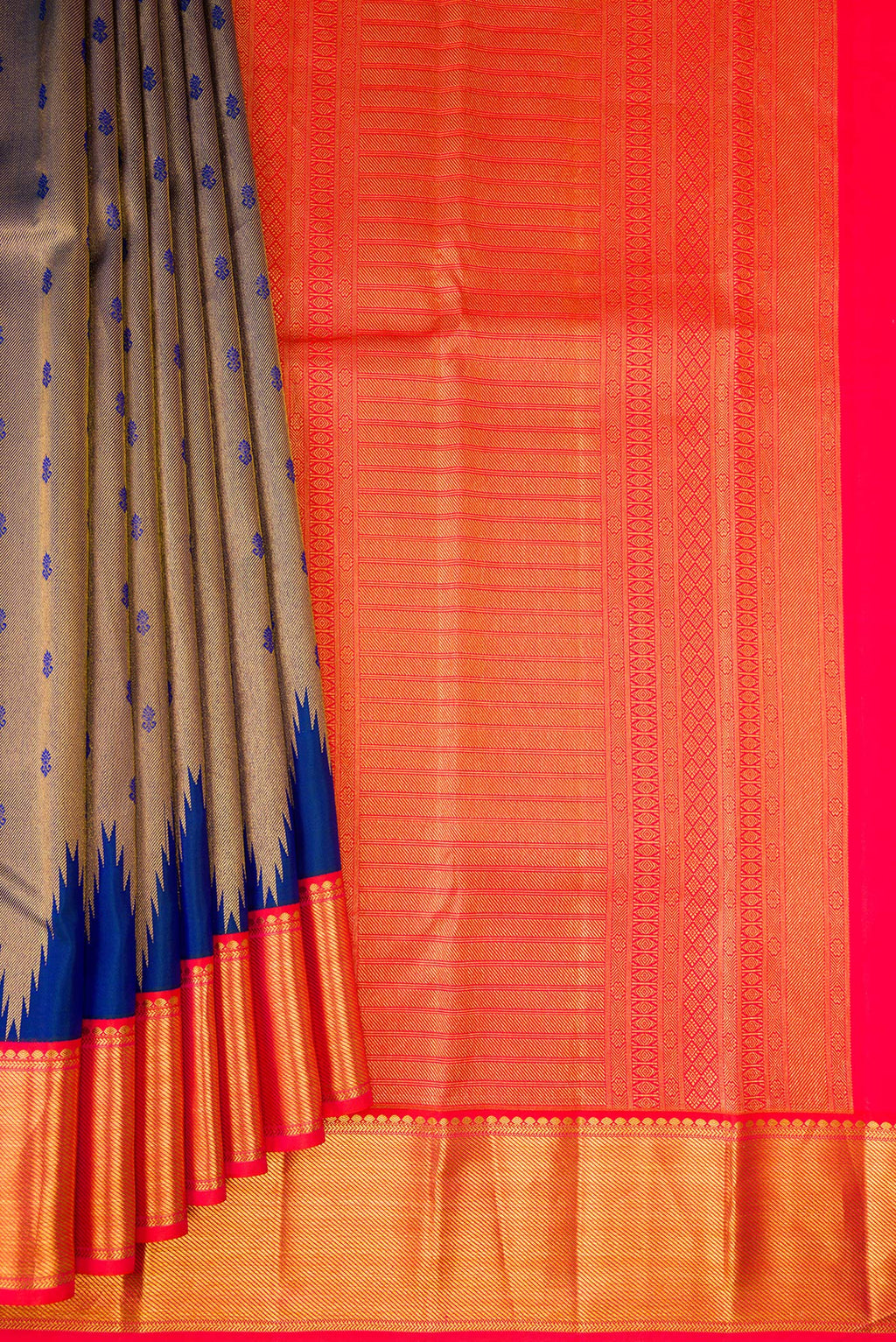 Pleats and pallu of Peacock Blue Kanjivaram Silk Saree with Zari Brocade on the body and Zari Border. 