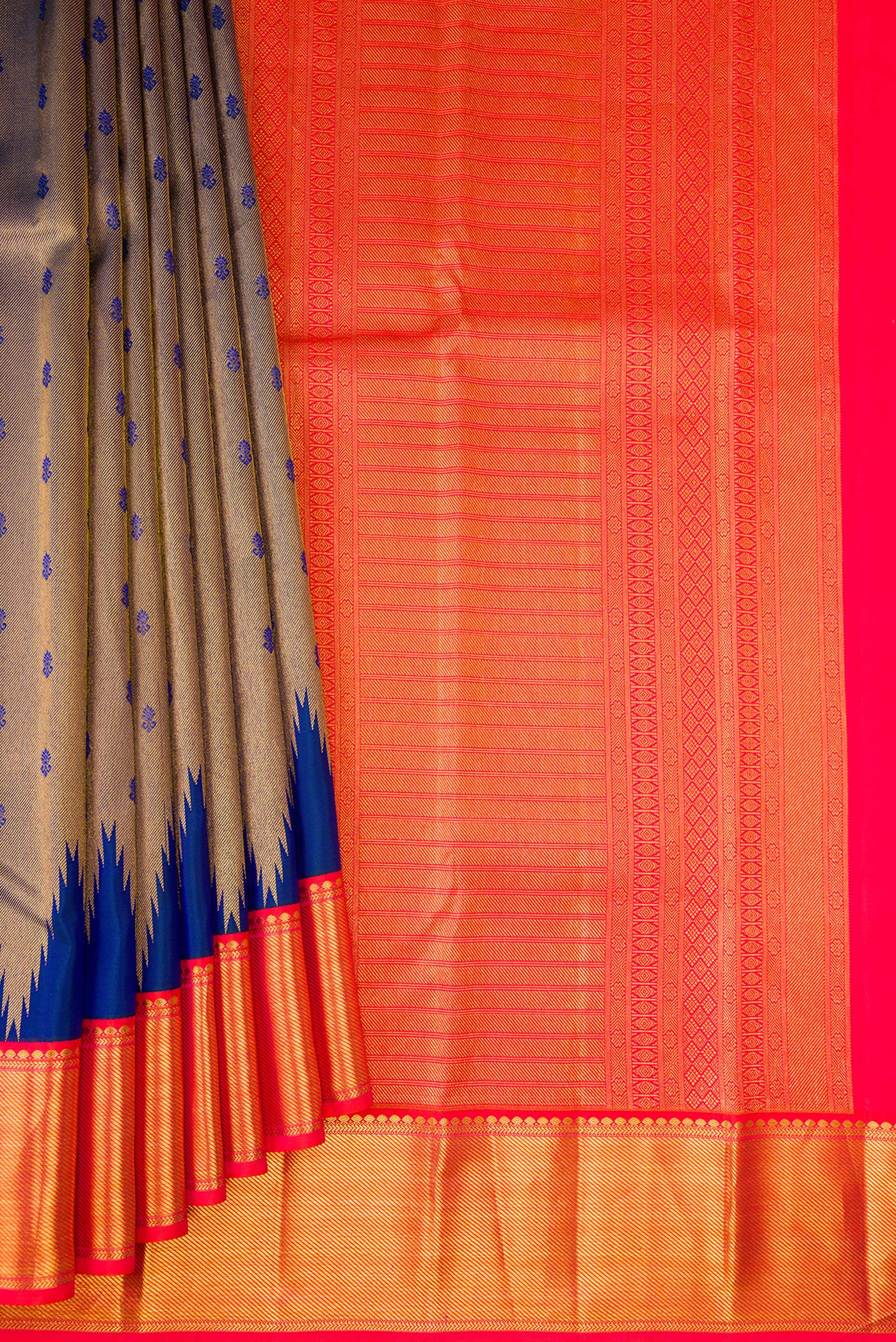 Pleats and pallu of Peacock Blue Kanjivaram Silk Saree with Zari Brocade on the body and Zari Border. 