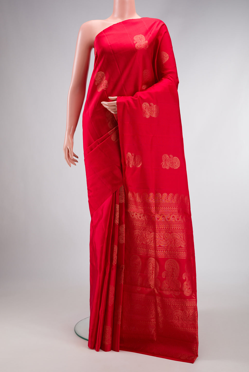 Red Dual Tone Kanjivaram Silk Saree with Zari Butta on the body and Without Border.  displayed on a mannequin