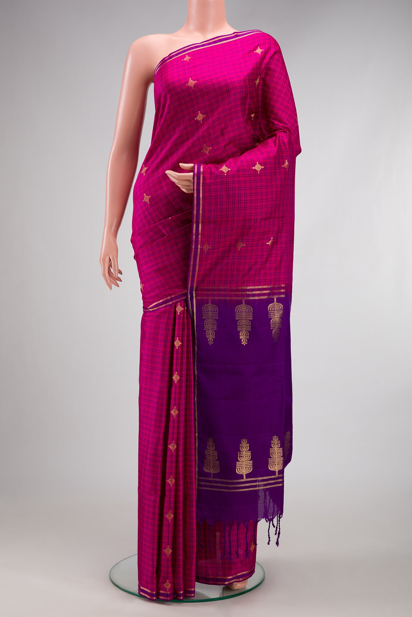 Dark Pink Soft Silk Saree with Checked design on the body and Zari Border.  displayed on a mannequin