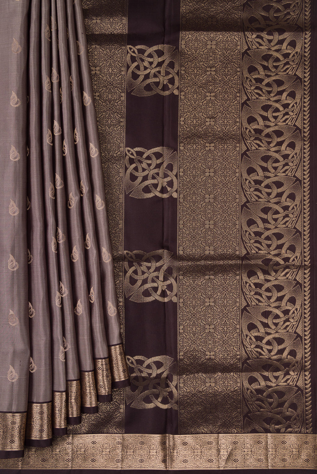 Pleats and pallu of Grey Dual Tone Soft Silk Saree with Zari Butta on the body and Zari Border. 