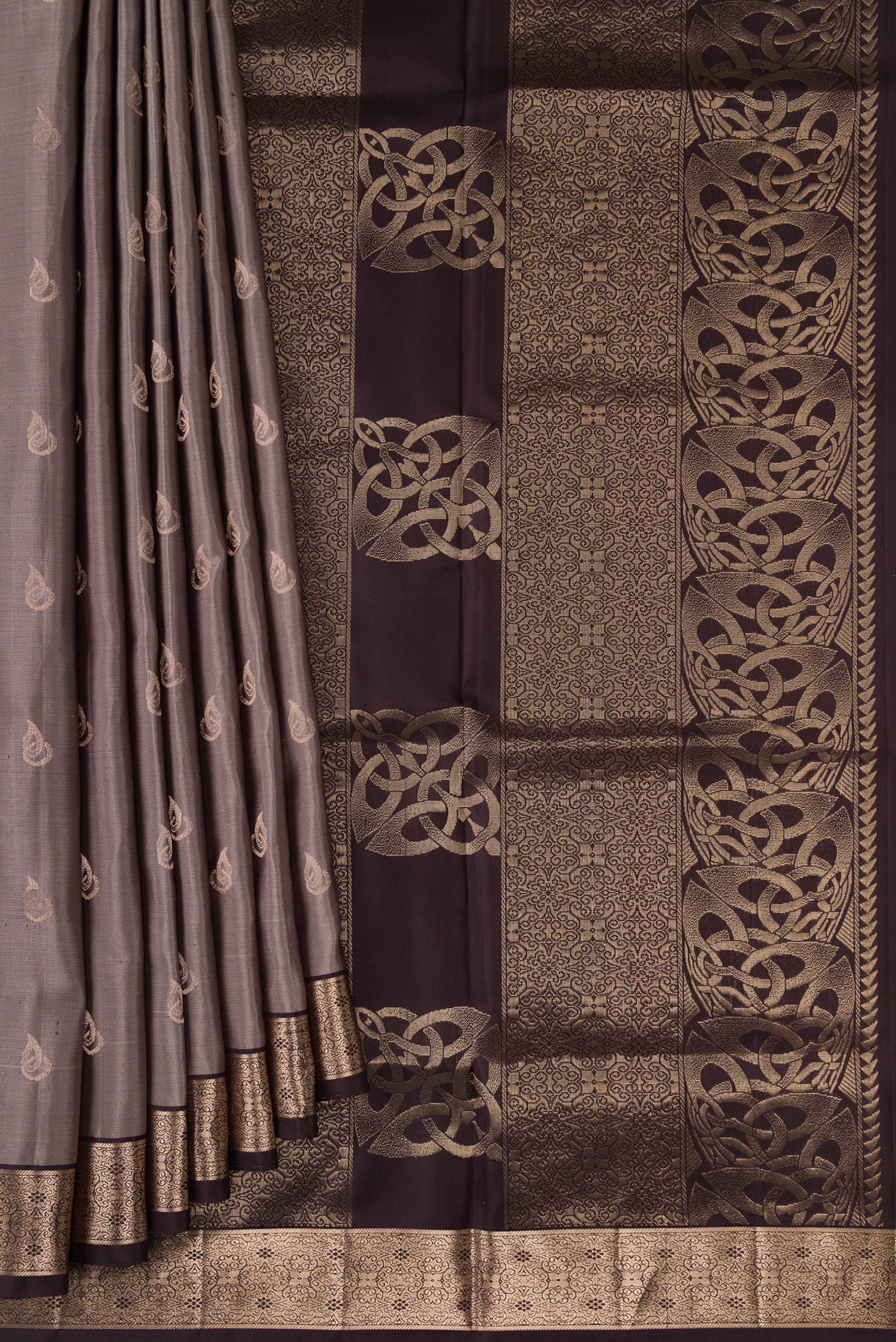 Pleats and pallu of Grey Dual Tone Soft Silk Saree with Zari Butta on the body and Zari Border. 