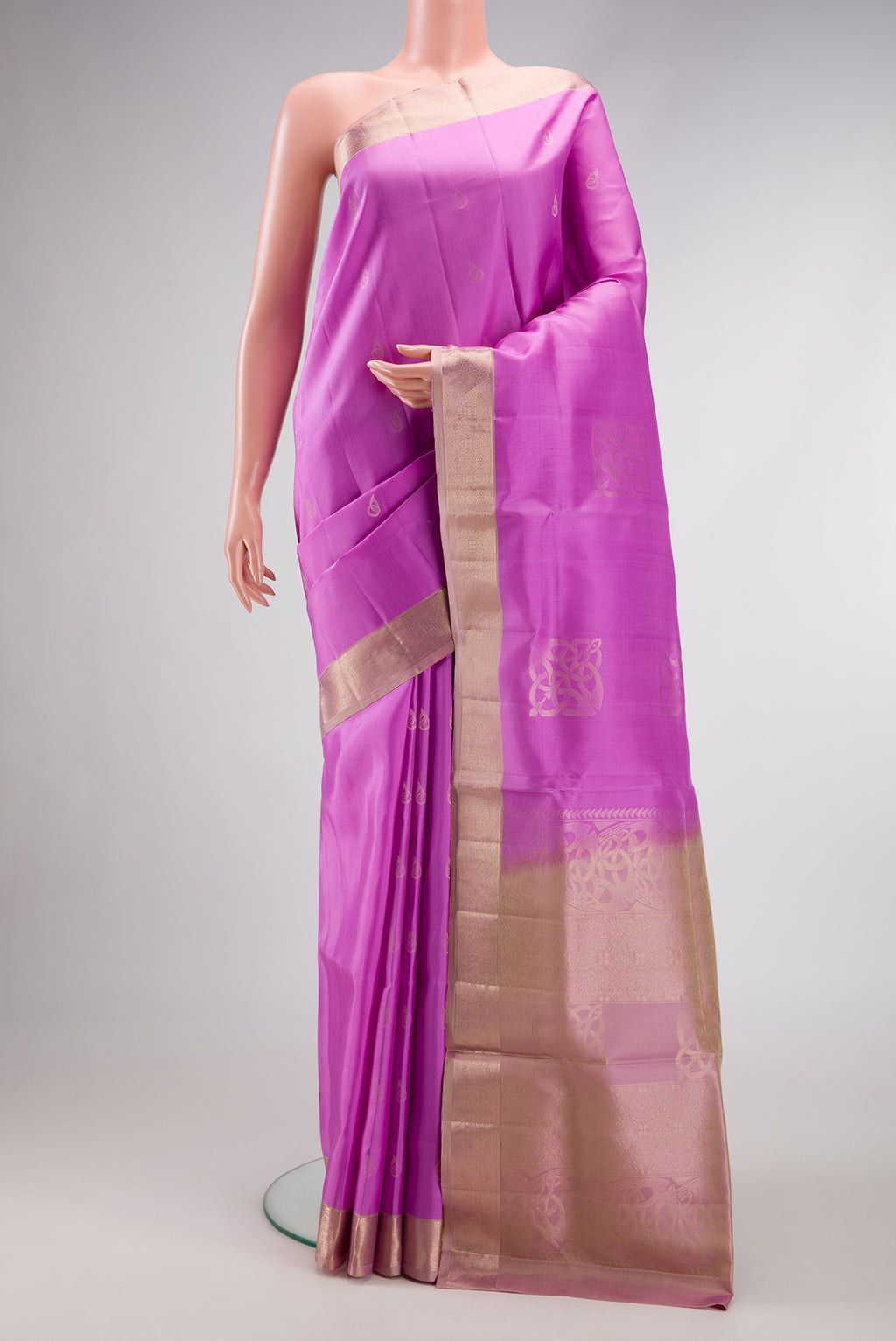 Lavender Dual Tone Soft Silk Saree with Zari Butta on the body and Zari Border.  displayed on a mannequin
