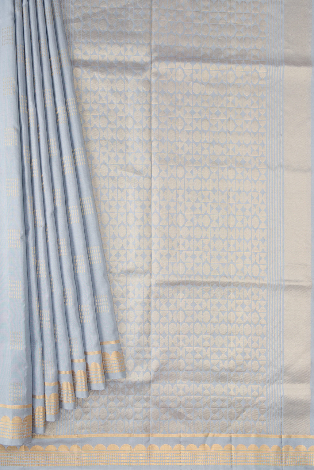 Pleats and pallu of Grey Dual Tone Soft Silk Saree with Zari Butta on the body and Zari Border. 