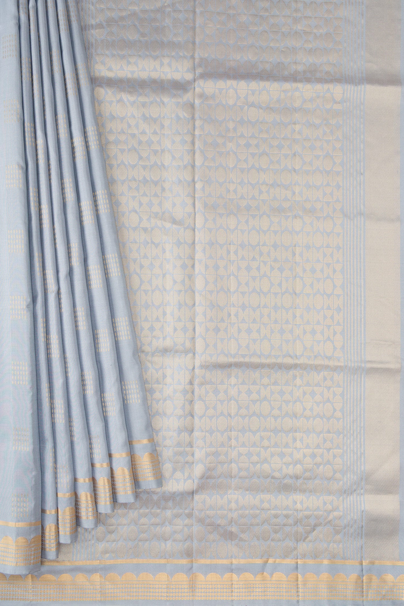 Pleats and pallu of Grey Dual Tone Soft Silk Saree with Zari Butta on the body and Zari Border. 