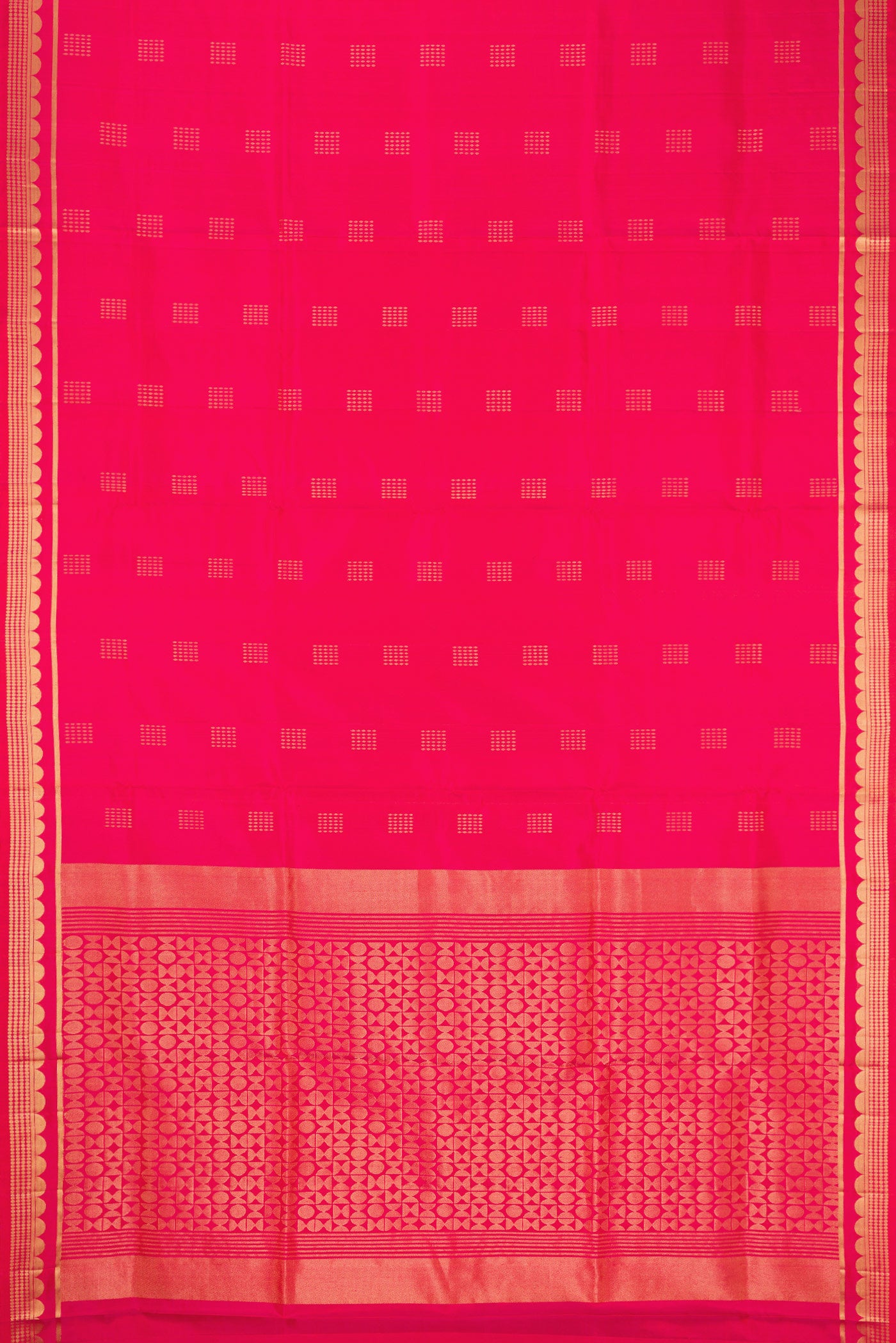Flat view of Coral Dual Tone Soft Silk Saree with Zari Butta on the body and Zari Border. 