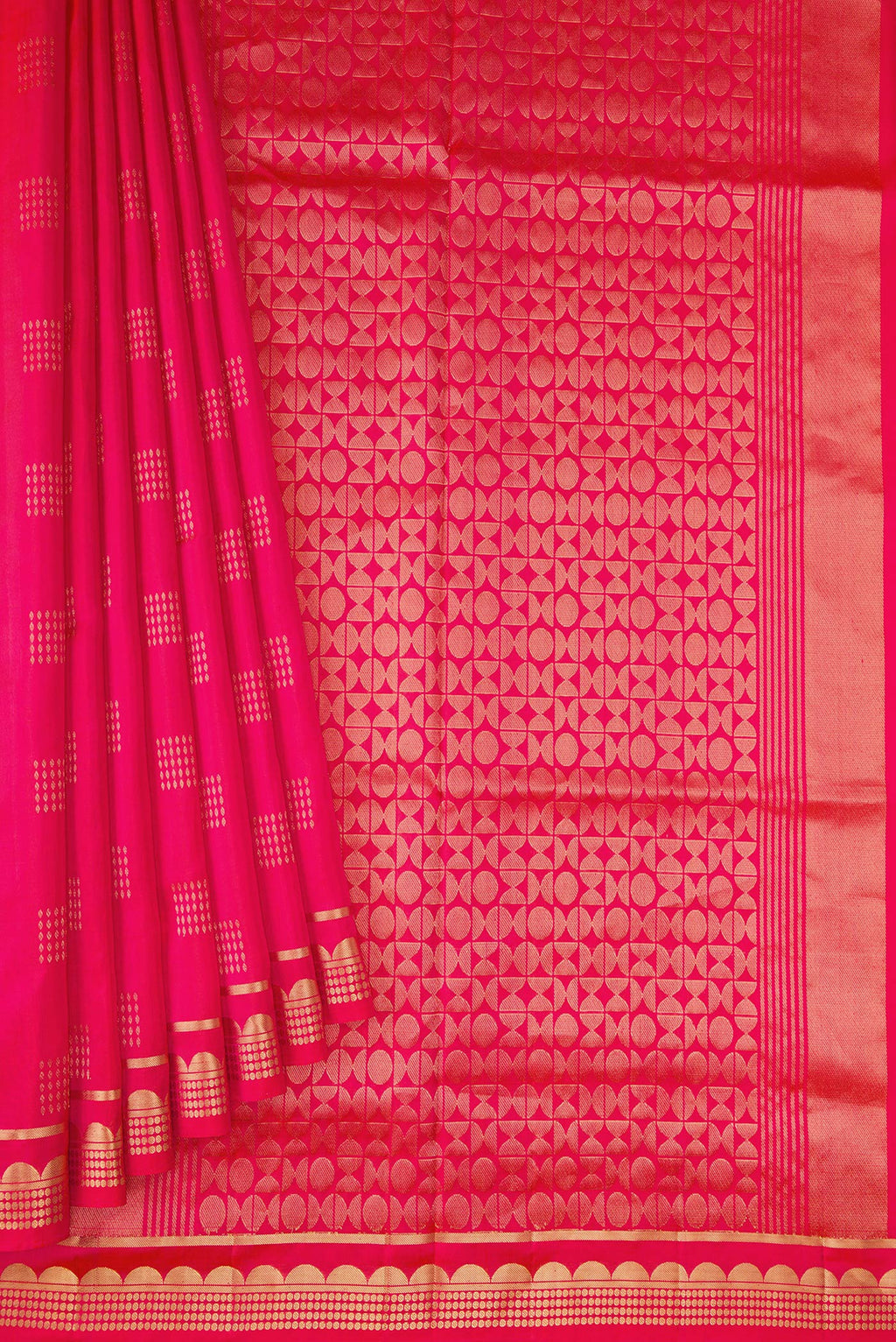 Pleats and pallu of Coral Dual Tone Soft Silk Saree with Zari Butta on the body and Zari Border. 