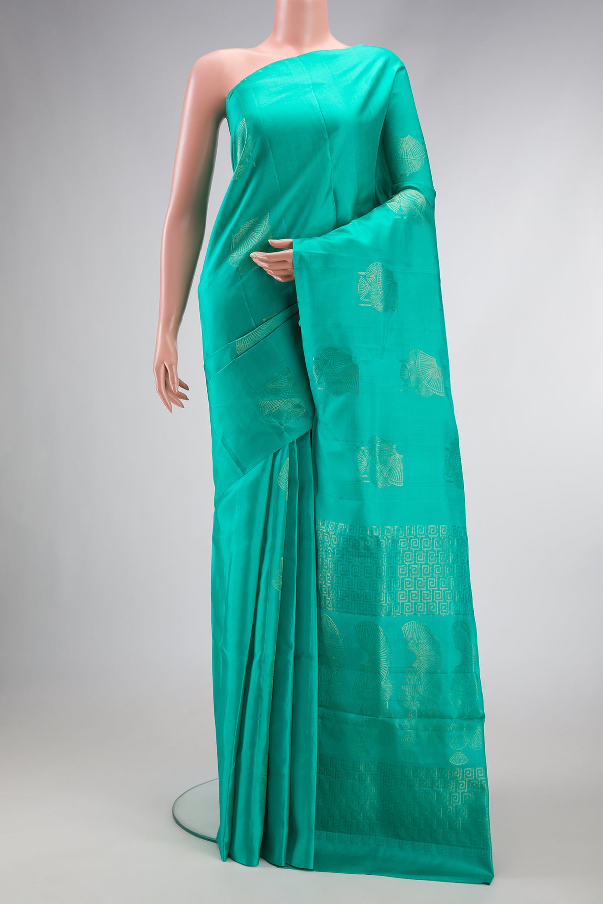 Sea Green Dual Tone Soft Silk Saree with Zari Butta on the body and Without Border.  displayed on a mannequin