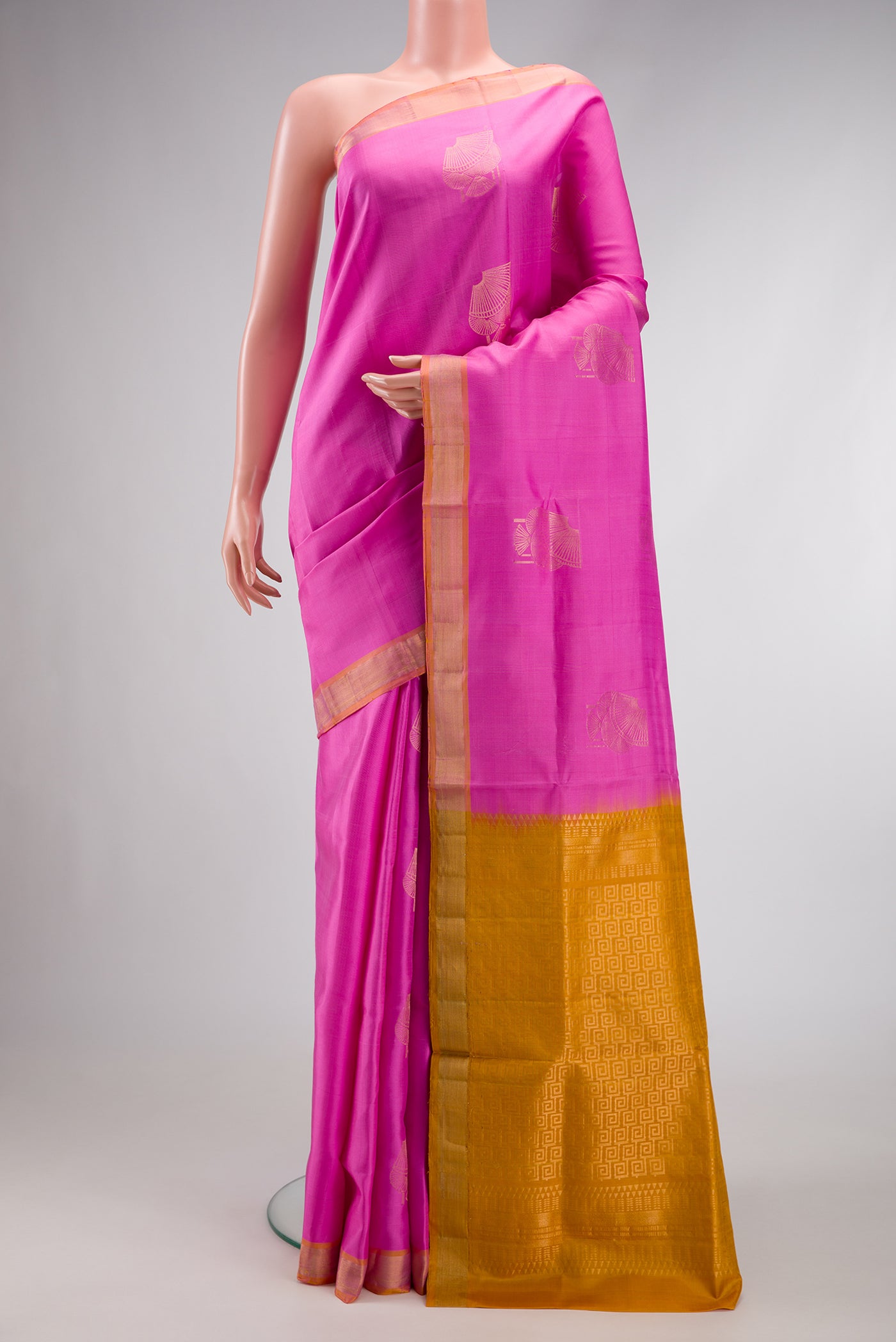 Pink Dual Tone Soft Silk Saree with Zari Butta on the body and Zari Border.  displayed on a mannequin