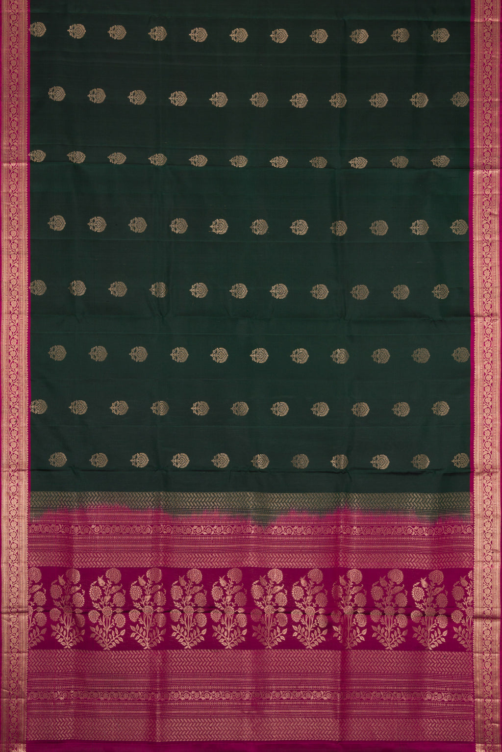 Flat view of Bottle Green Dual Tone Soft Silk Saree with Zari Butta on the body and Zari Border. 