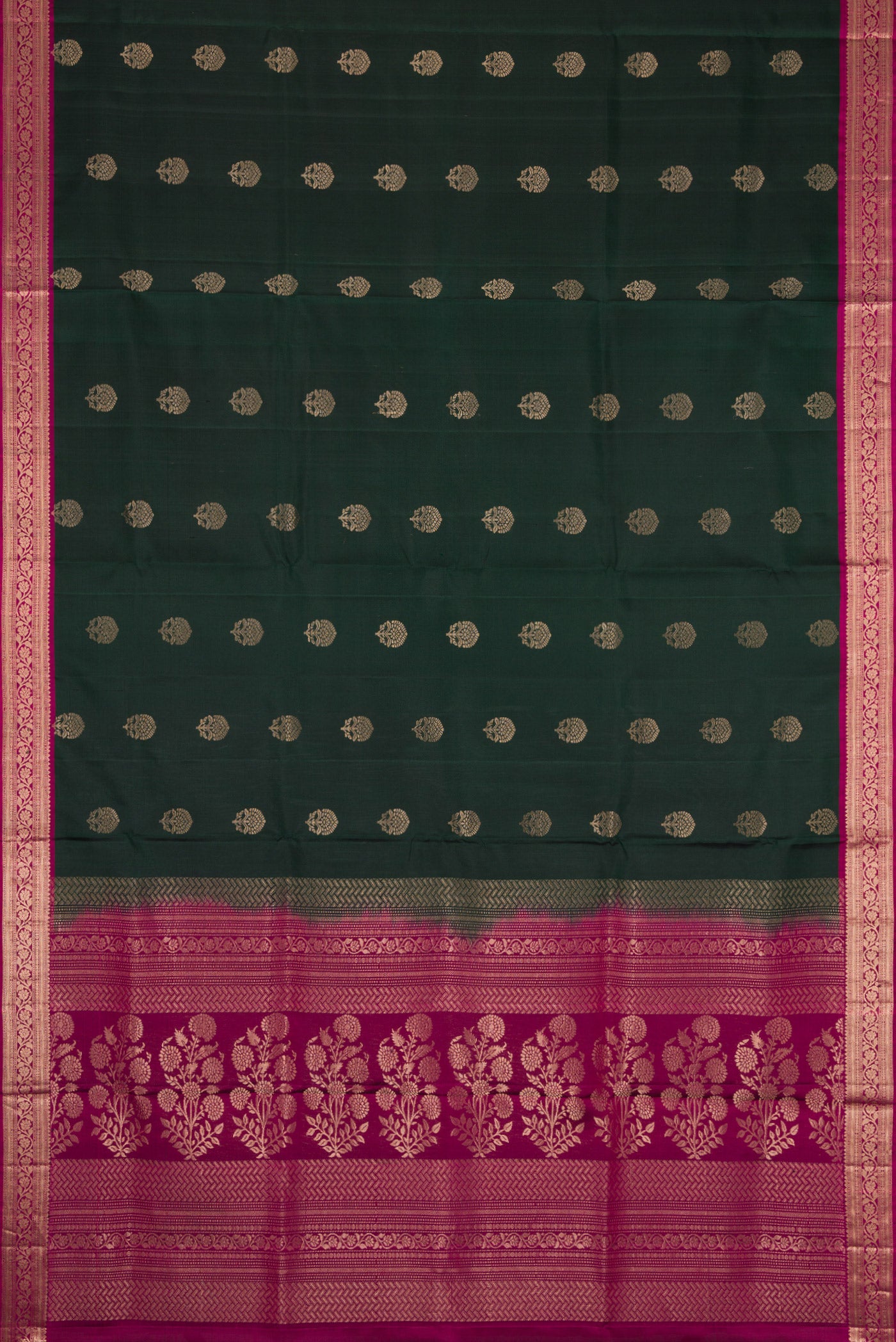 Flat view of Bottle Green Dual Tone Soft Silk Saree with Zari Butta on the body and Zari Border. 