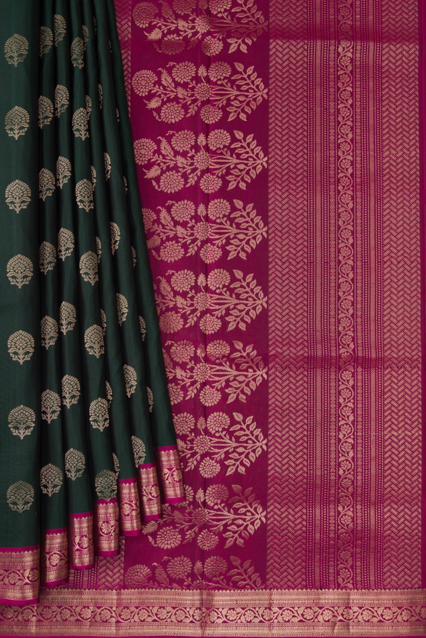 Pleats and pallu of Bottle Green Dual Tone Soft Silk Saree with Zari Butta on the body and Zari Border. 