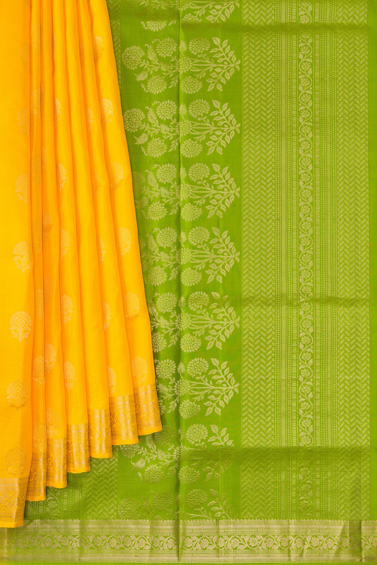 Pleats and pallu of Yellow Dual Tone Soft Silk Saree with Zari Butta on the body and Zari Border. 