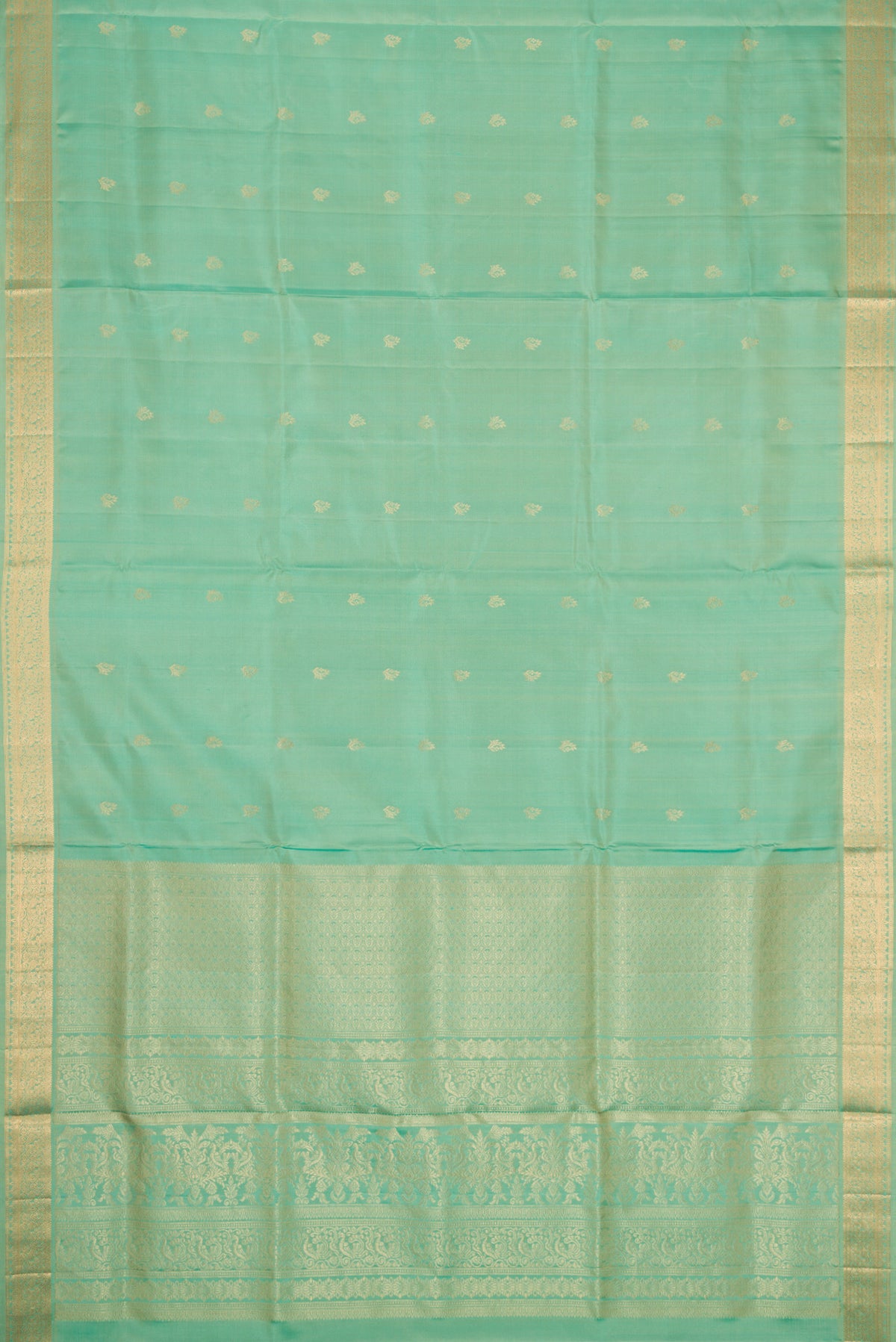 Flat view of Pista Green Dual Tone Soft Silk Saree with Zari Butta on the body and Zari Border. 