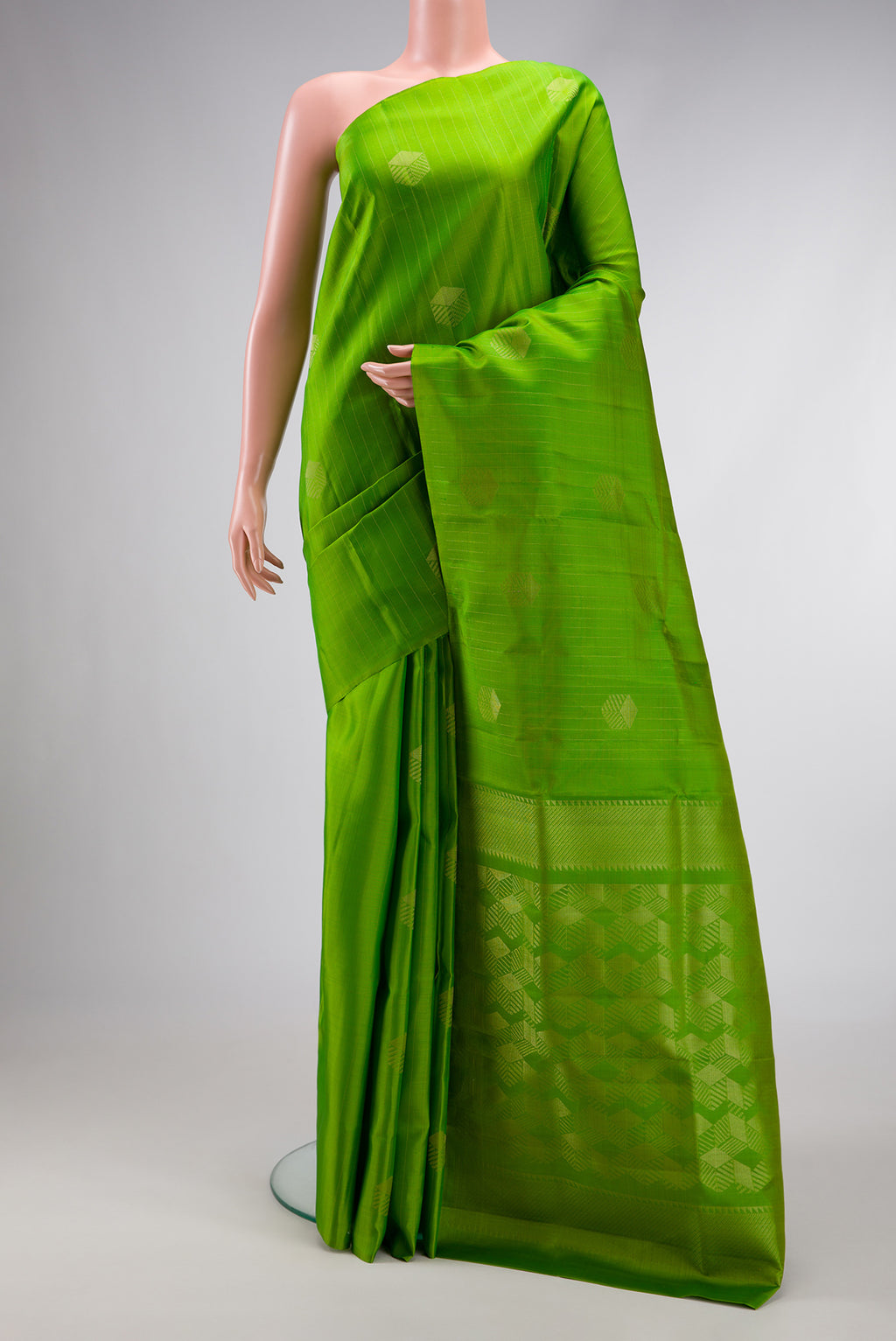 Parrot Green Dual Tone Kanjivaram Silk Saree with Stripes on the body and Without Border.  displayed on a mannequin