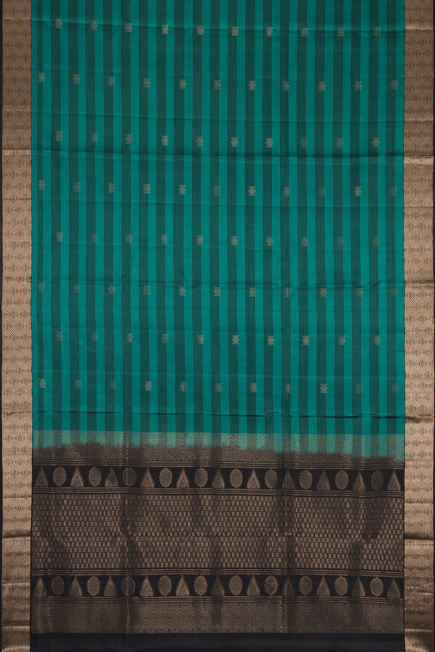 Flat view of Maya Blue Dual Tone Soft Silk Saree with Zari Butta on the body and Zari Border. 
