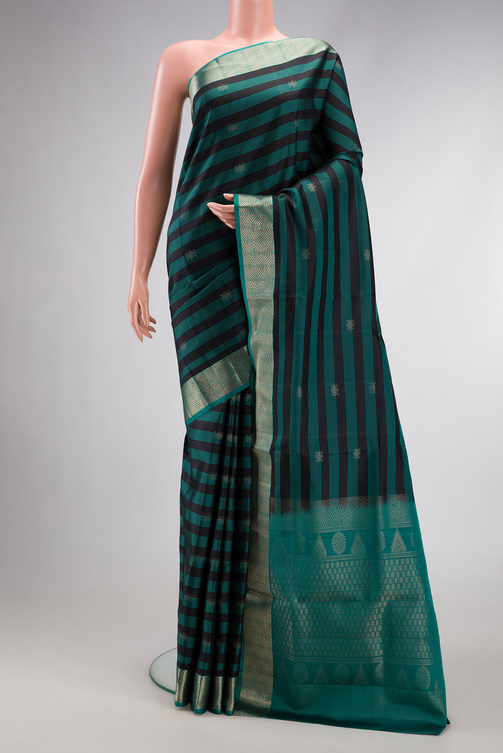 Maya Blue Dual Tone Soft Silk Saree with Stripes on the body and Zari Border.  displayed on a mannequin