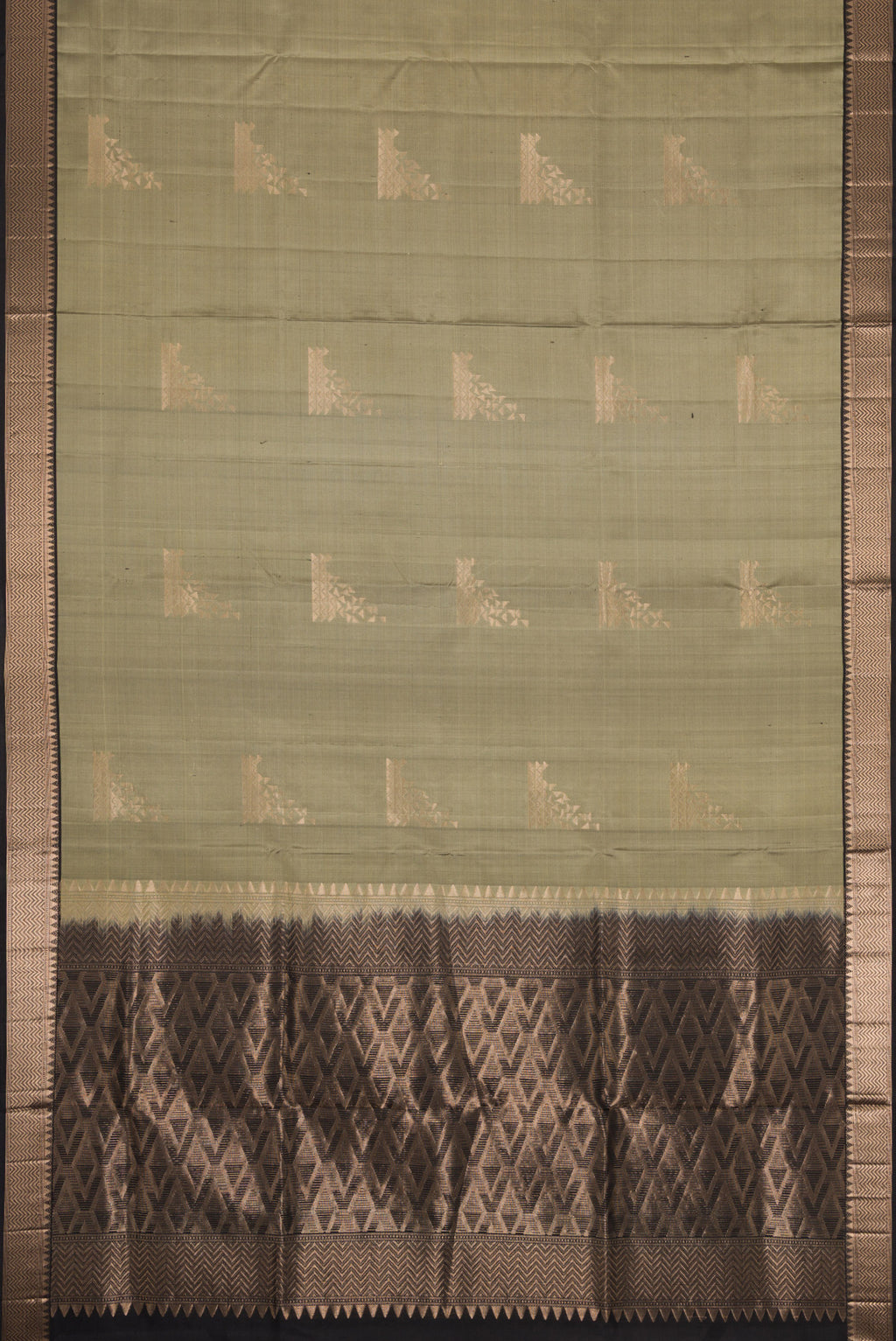 Flat view of Grey Dual Tone Soft Silk Saree with Zari Butta on the body and Zari Border. 