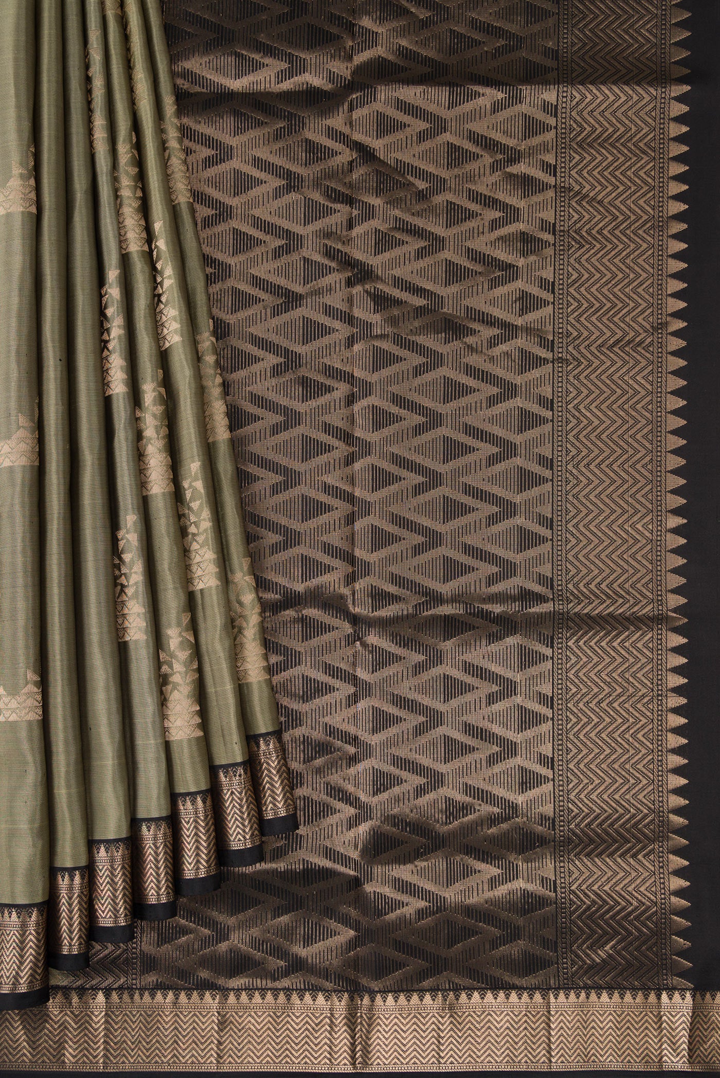 Pleats and pallu of Grey Dual Tone Soft Silk Saree with Zari Butta on the body and Zari Border. 