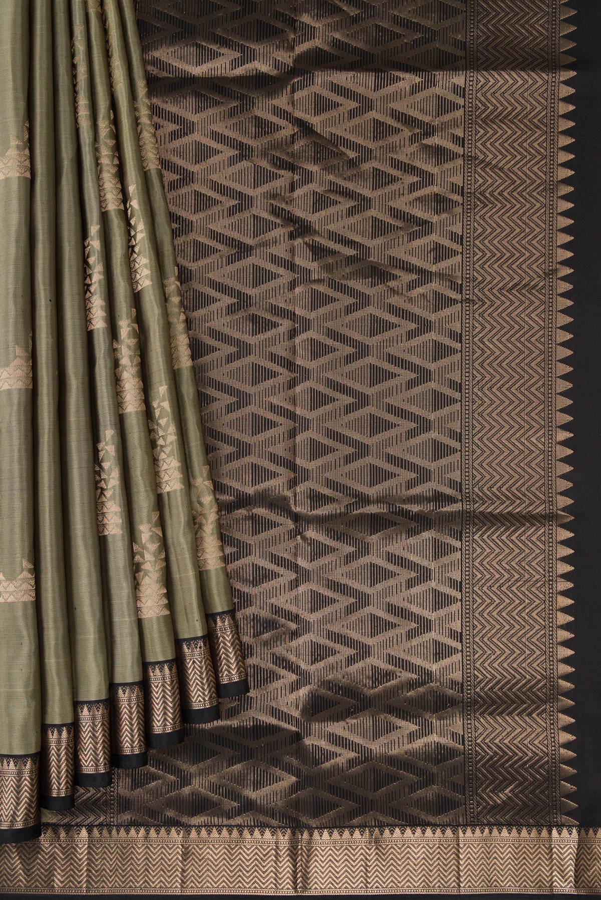 Pleats and pallu of Grey Dual Tone Soft Silk Saree with Zari Butta on the body and Zari Border. 