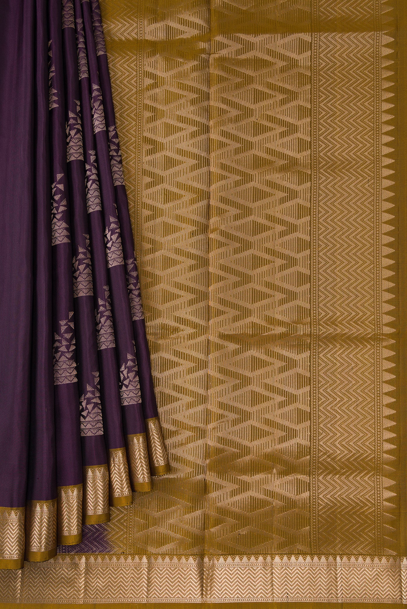 Pleats and pallu of Burgundy Dual Tone Soft Silk Saree with Zari Butta on the body and Zari Border. 