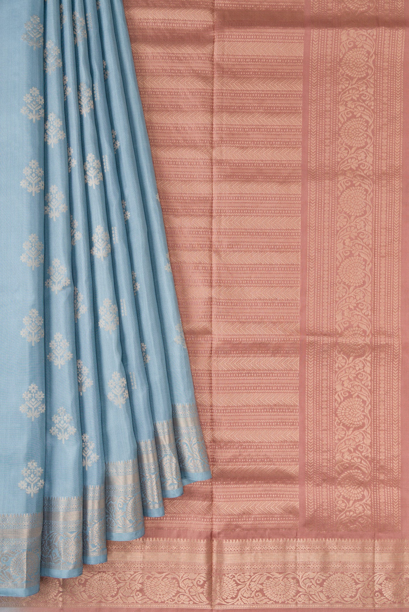 Pleats and pallu of Light Blue Dual Tone Soft Silk Saree with Zari Butta on the body and Zari Border. 