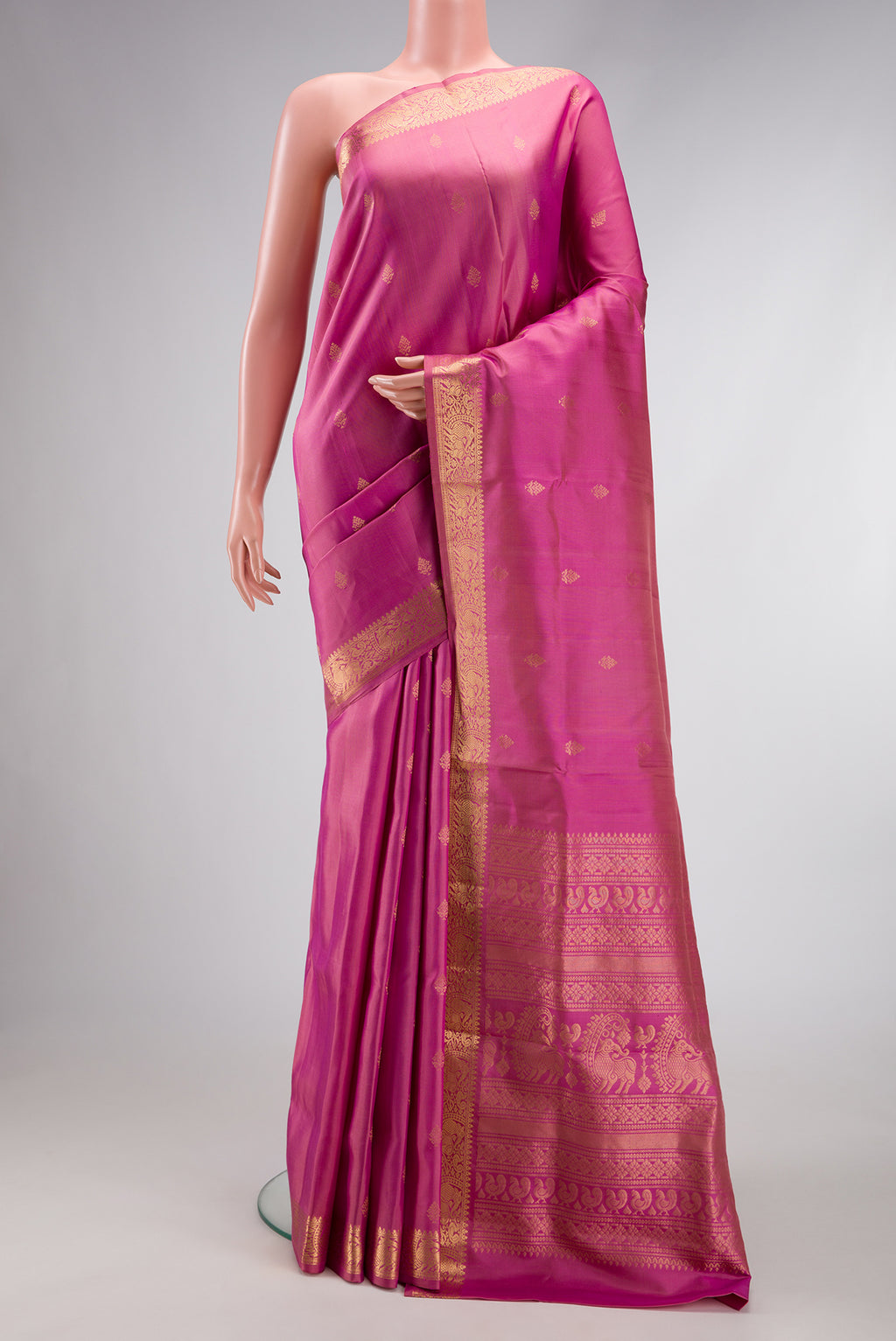 Pink Dual Tone Soft Silk Saree with Zari Butta on the body and Zari Border.  displayed on a mannequin