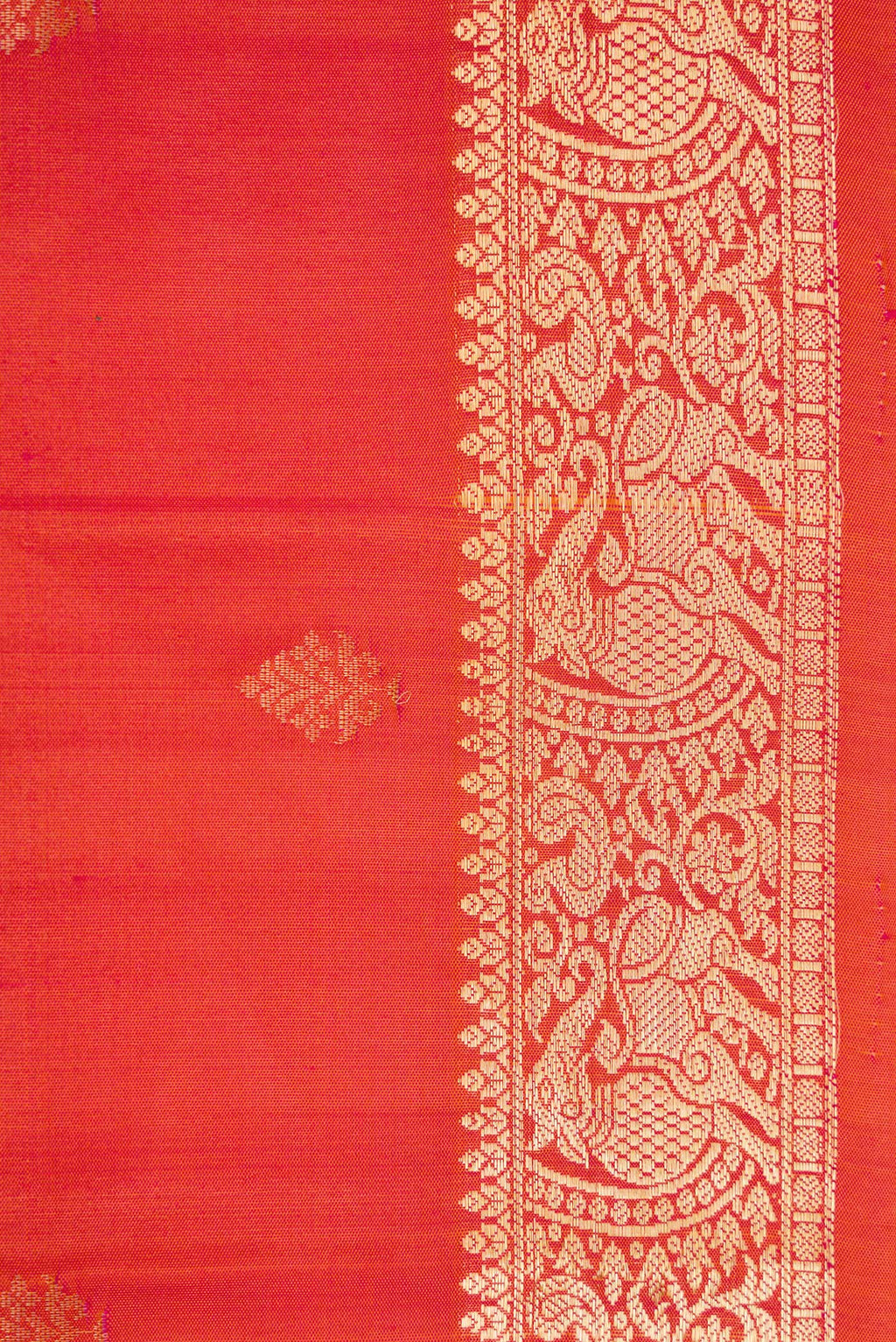 Border image of Brick Orange Dual Tone Soft Silk Saree with Zari Butta on the body and Zari Border. 