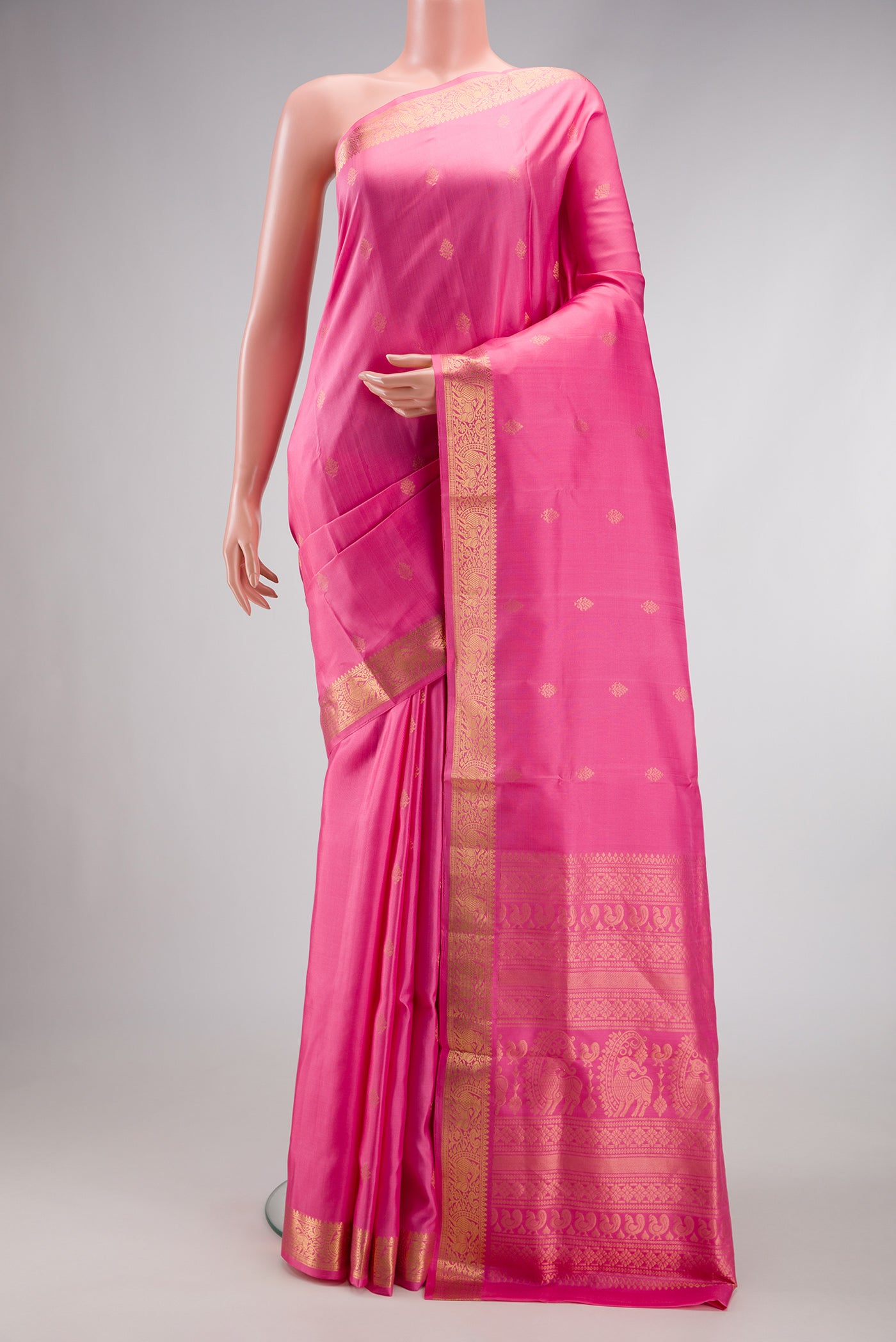 Pink Dual Tone Soft Silk Saree with Zari Butta on the body and Zari Border.  displayed on a mannequin