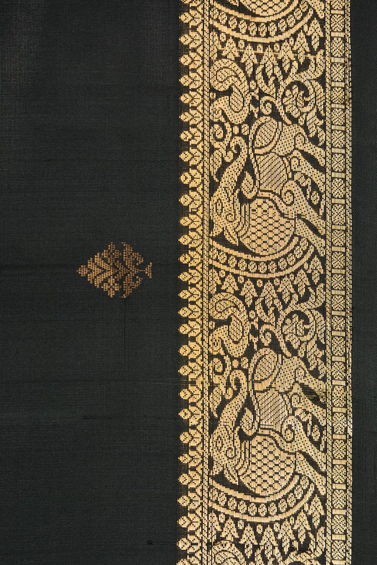 Border image of Black Dual Tone Soft Silk Saree with Zari Butta on the body and Zari Border. 