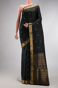 Black Dual Tone Soft Silk Saree with Zari Butta on the body and Zari Border.  displayed on a mannequin