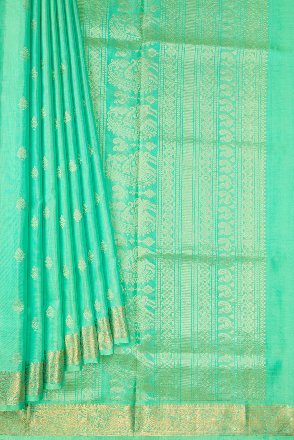 Pleats and pallu of Pista Green Dual Tone Soft Silk Saree with Zari Butta on the body and Zari Border. 