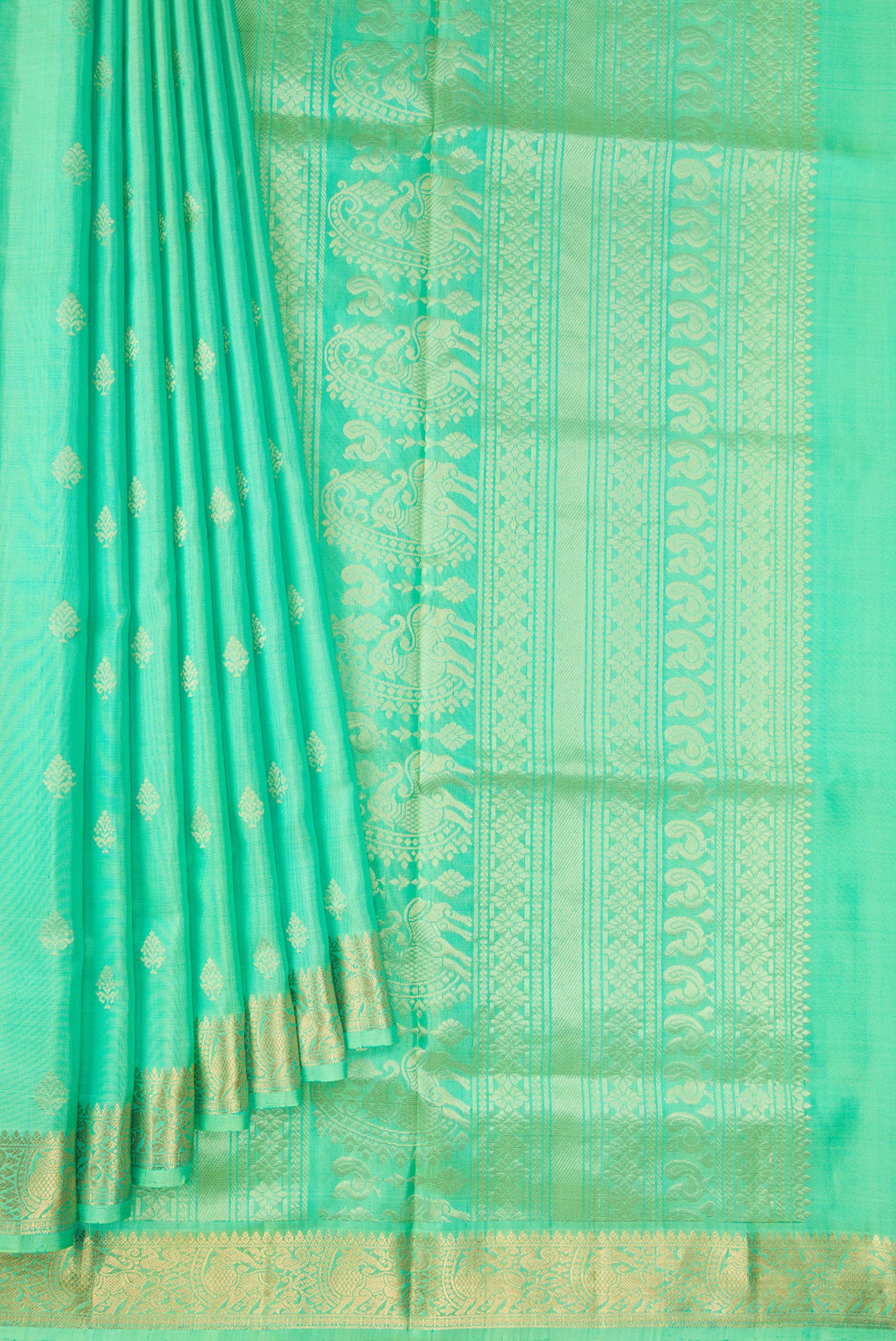 Pleats and pallu of Pista Green Dual Tone Soft Silk Saree with Zari Butta on the body and Zari Border. 