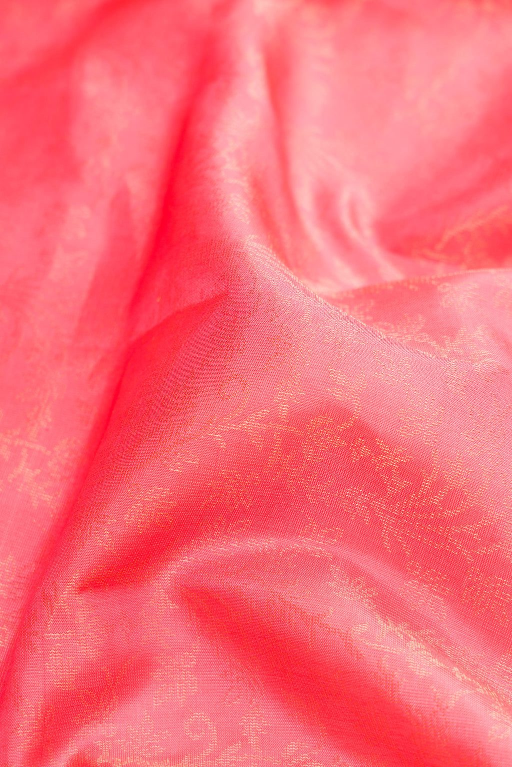 Close up of Pink Dual Tone Soft Silk Saree with Zari Brocade on the body and Zari Border.  displaying folds
