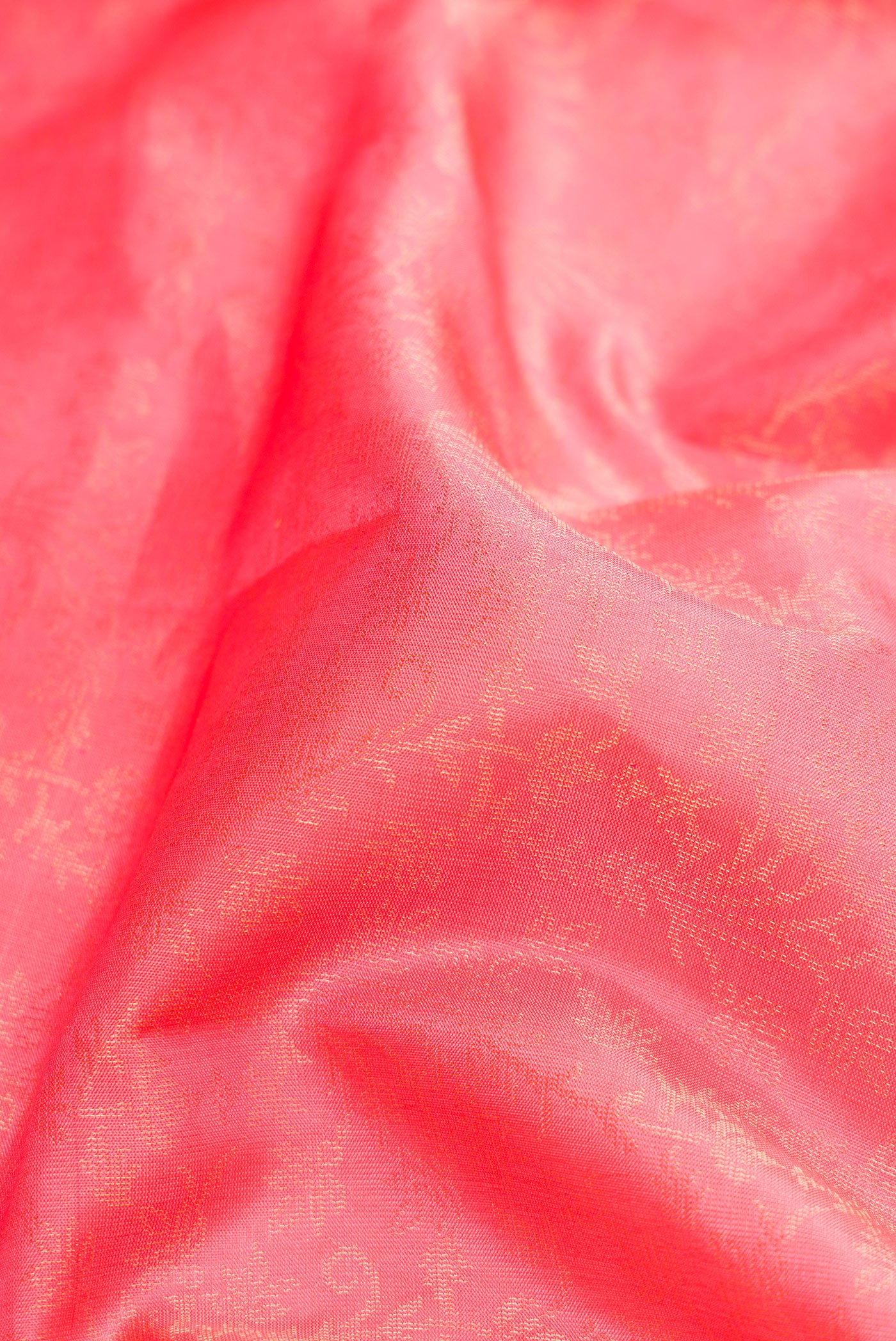 Close up of Pink Dual Tone Soft Silk Saree with Zari Brocade on the body and Zari Border.  displaying folds