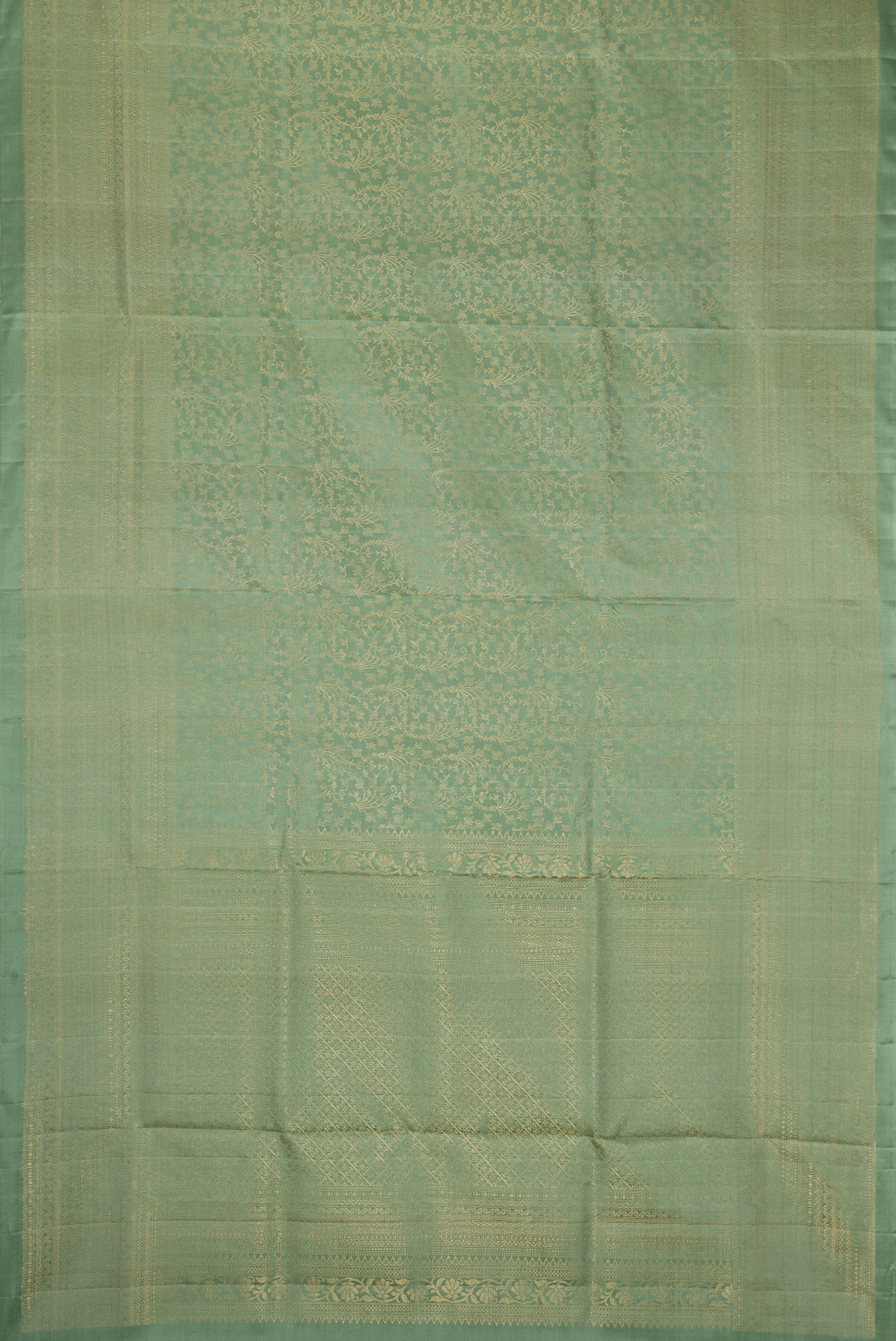 Flat view of Light Green Dual Tone Soft Silk Saree with Zari Brocade on the body and Zari Border. 