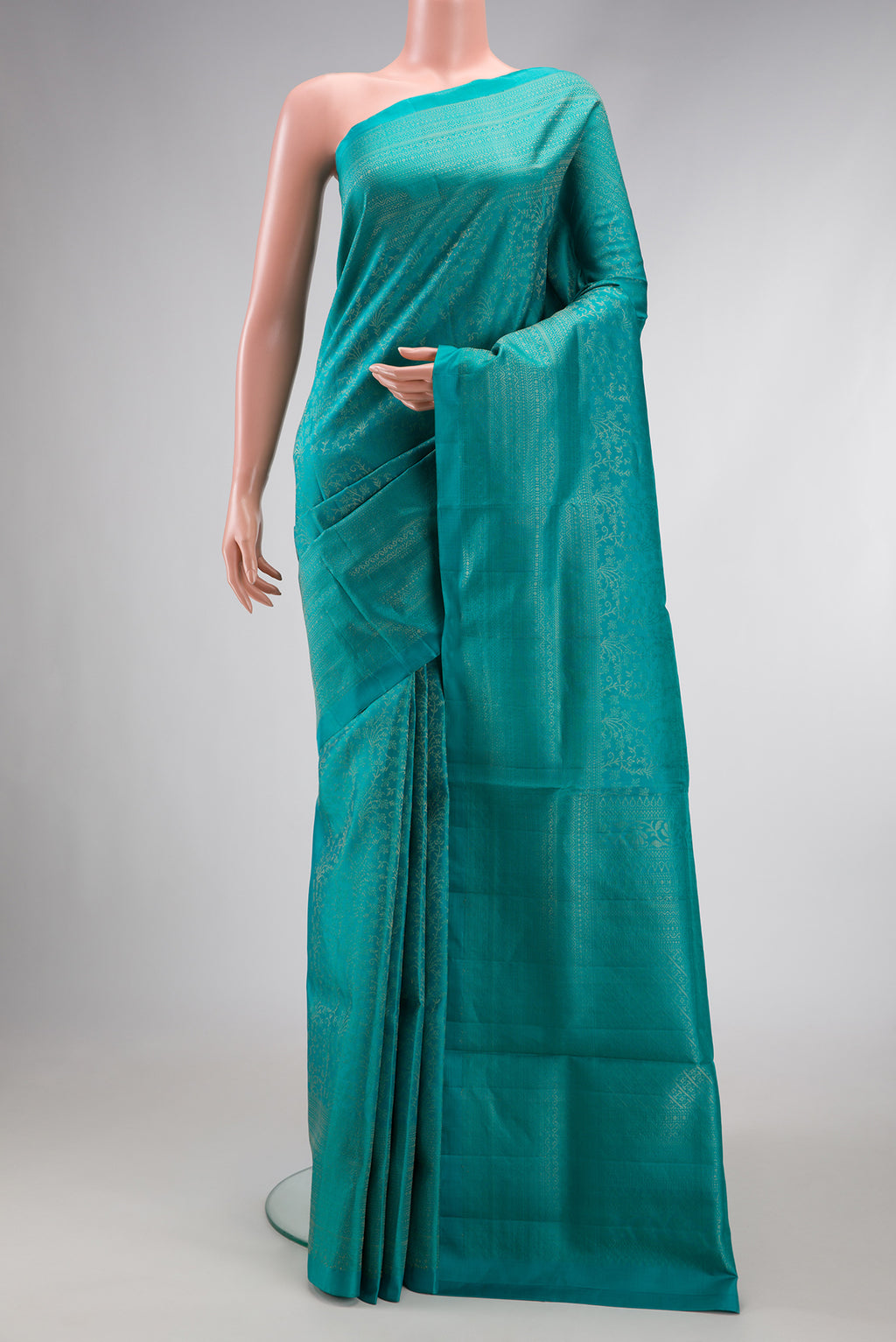 Sky Blue Dual Tone Soft Silk Saree with Zari Brocade on the body and Zari Border.  displayed on a mannequin