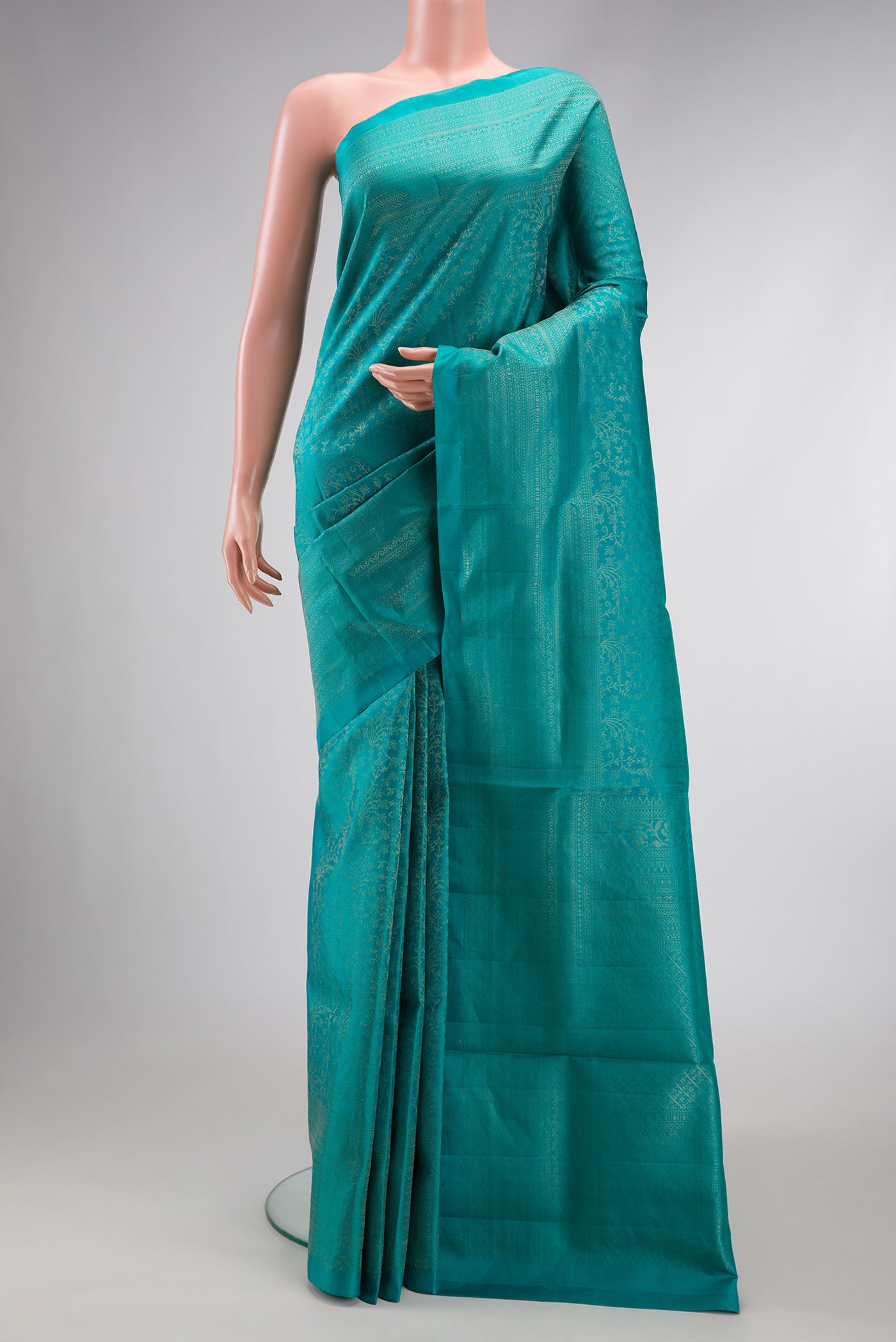 Sky Blue Dual Tone Soft Silk Saree with Zari Brocade on the body and Zari Border.  displayed on a mannequin