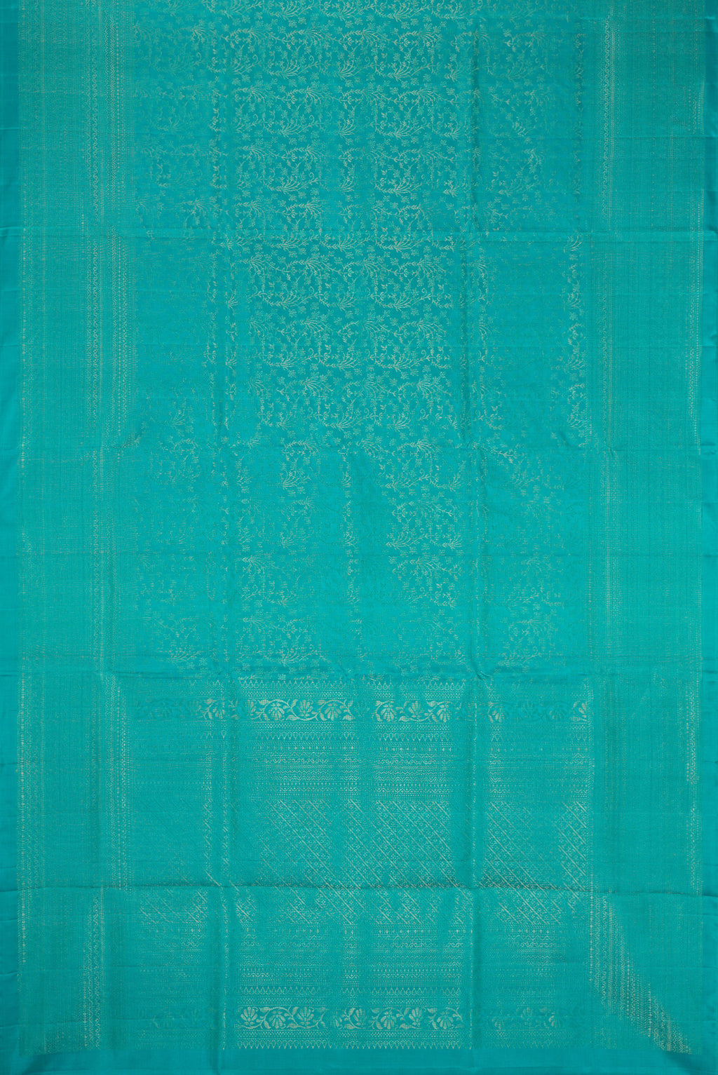 Flat view of Sky Blue Dual Tone Soft Silk Saree with Zari Brocade on the body and Zari Border. 