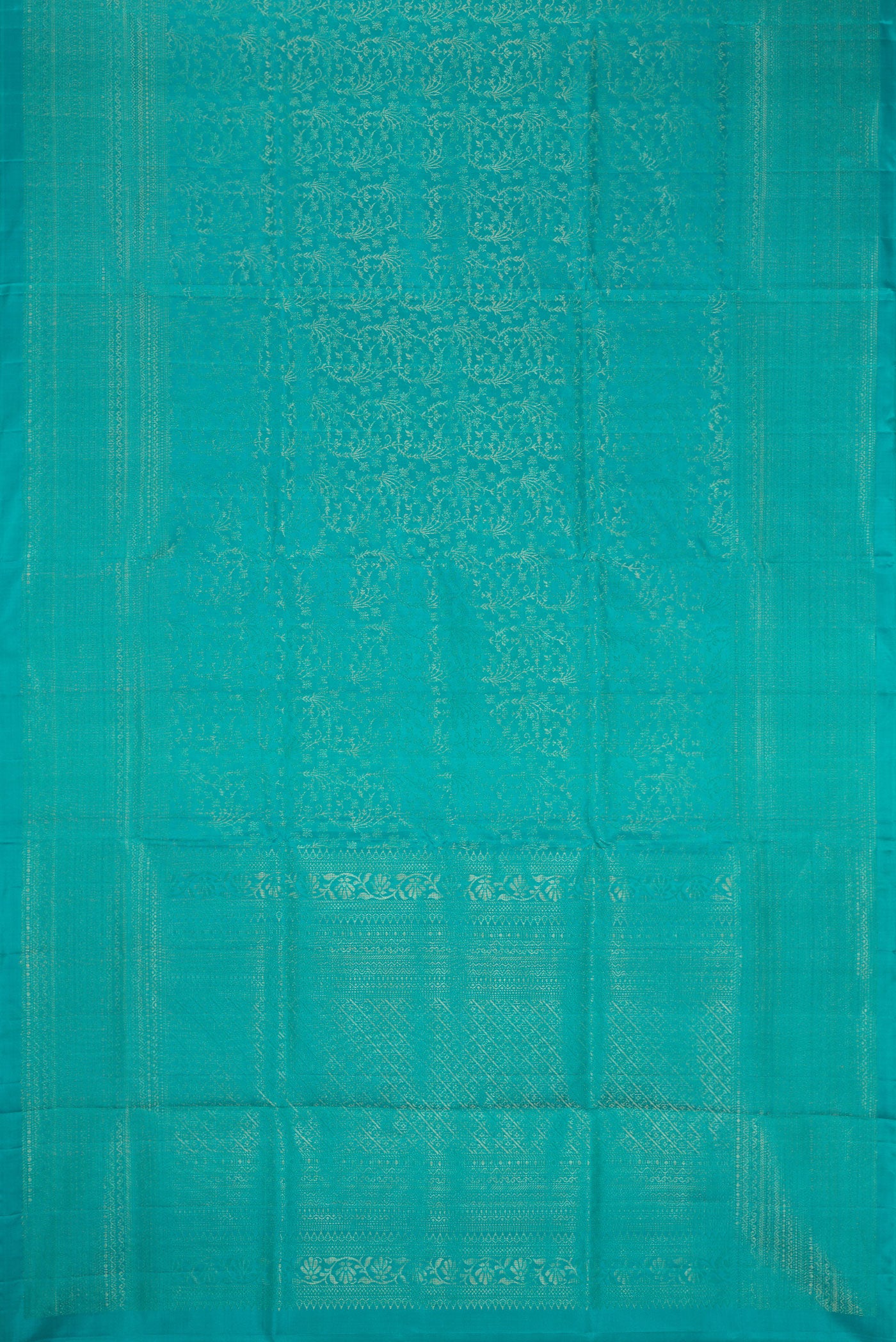 Flat view of Sky Blue Dual Tone Soft Silk Saree with Zari Brocade on the body and Zari Border. 