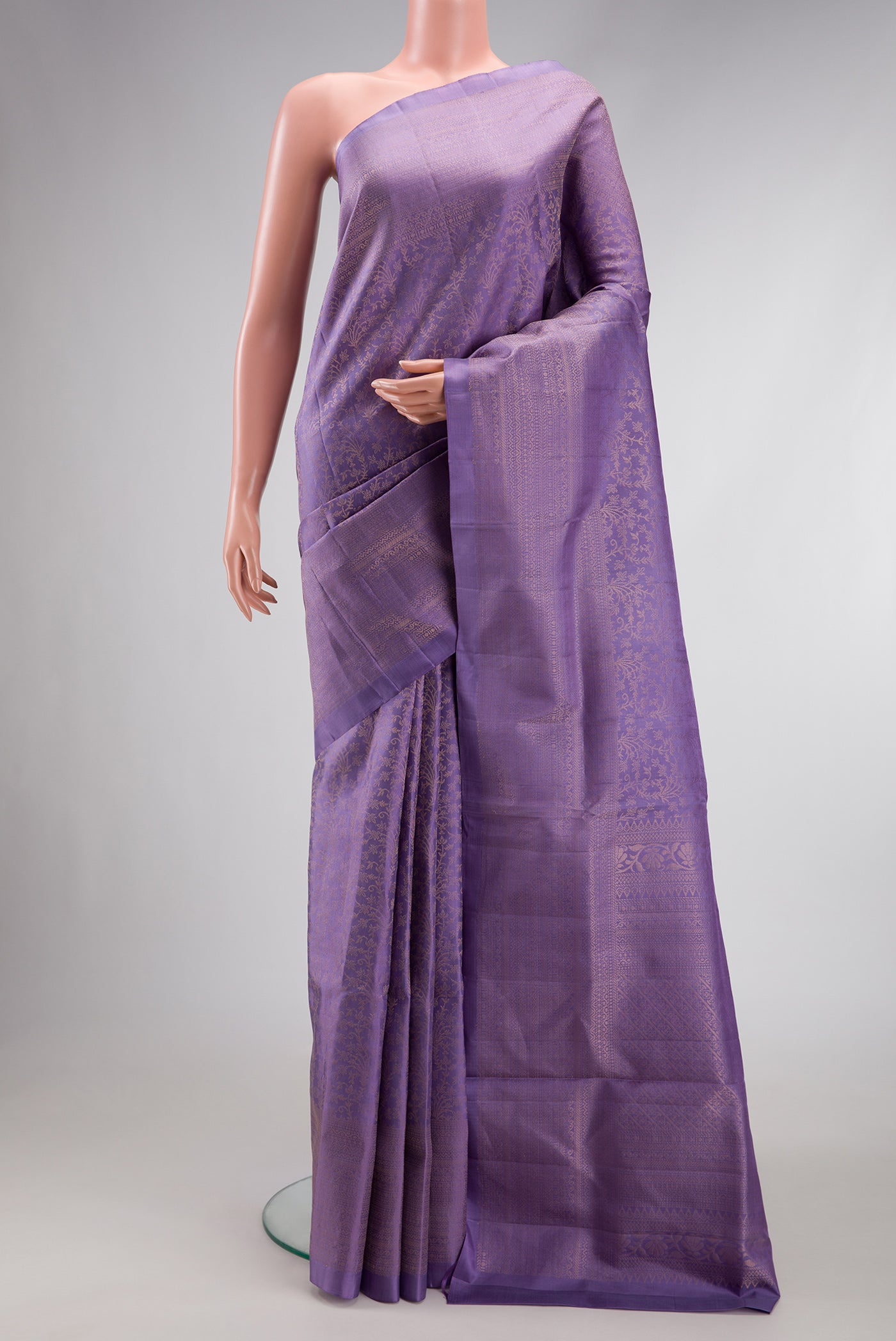 Lavender Dual Tone Soft Silk Saree with Zari Brocade on the body and Zari Border.  displayed on a mannequin