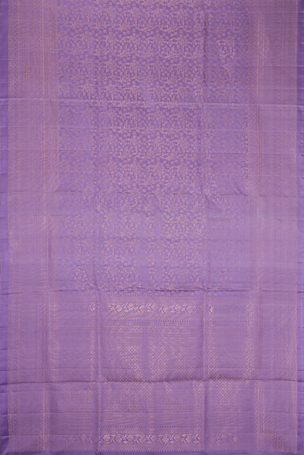 Flat view of Lavender Dual Tone Soft Silk Saree with Zari Brocade on the body and Zari Border. 