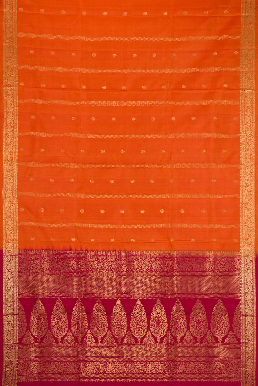 Flat view of Brick Orange Dual Tone Soft Silk Saree with Stripes on the body and Zari Border. 