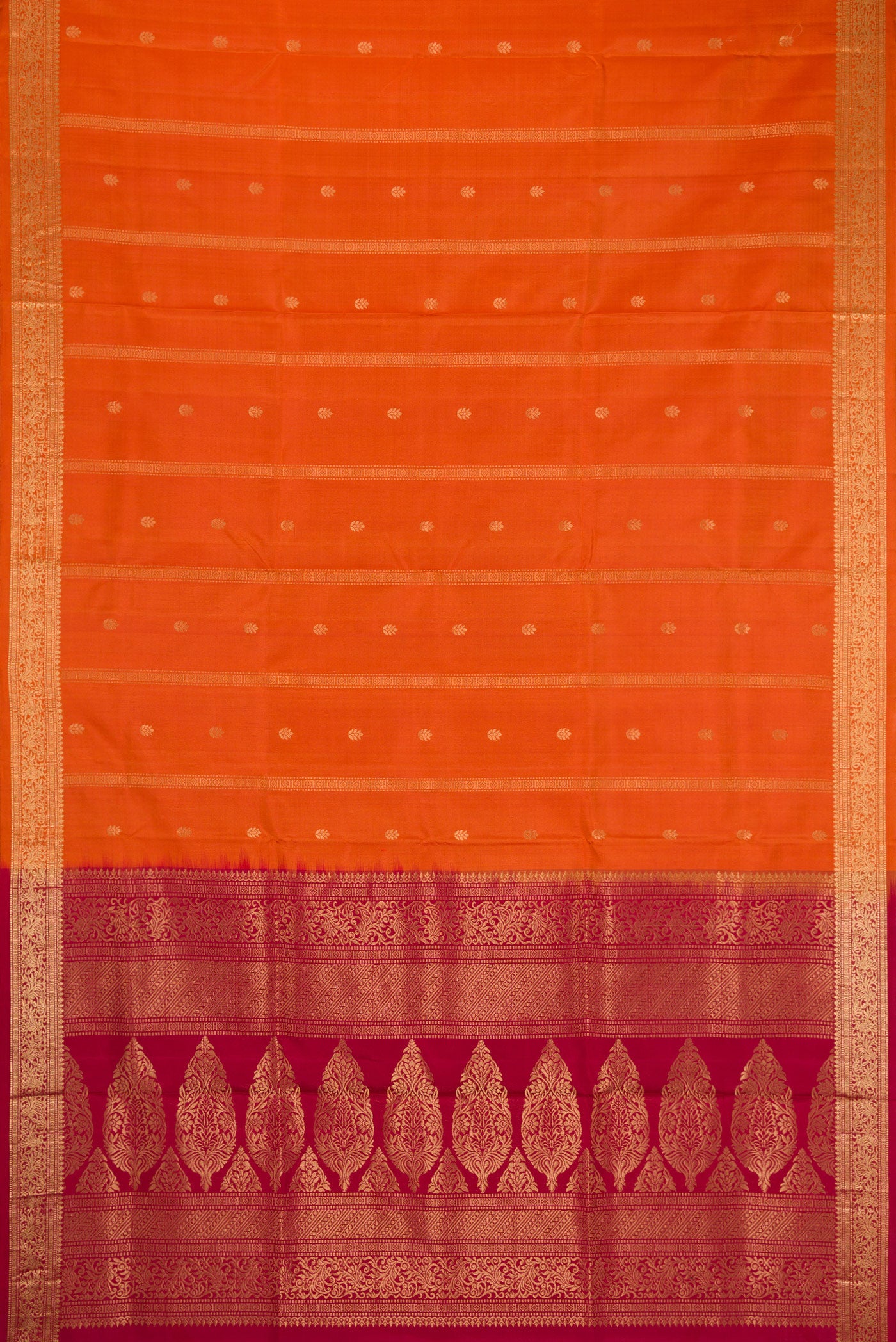 Flat view of Brick Orange Dual Tone Soft Silk Saree with Stripes on the body and Zari Border. 