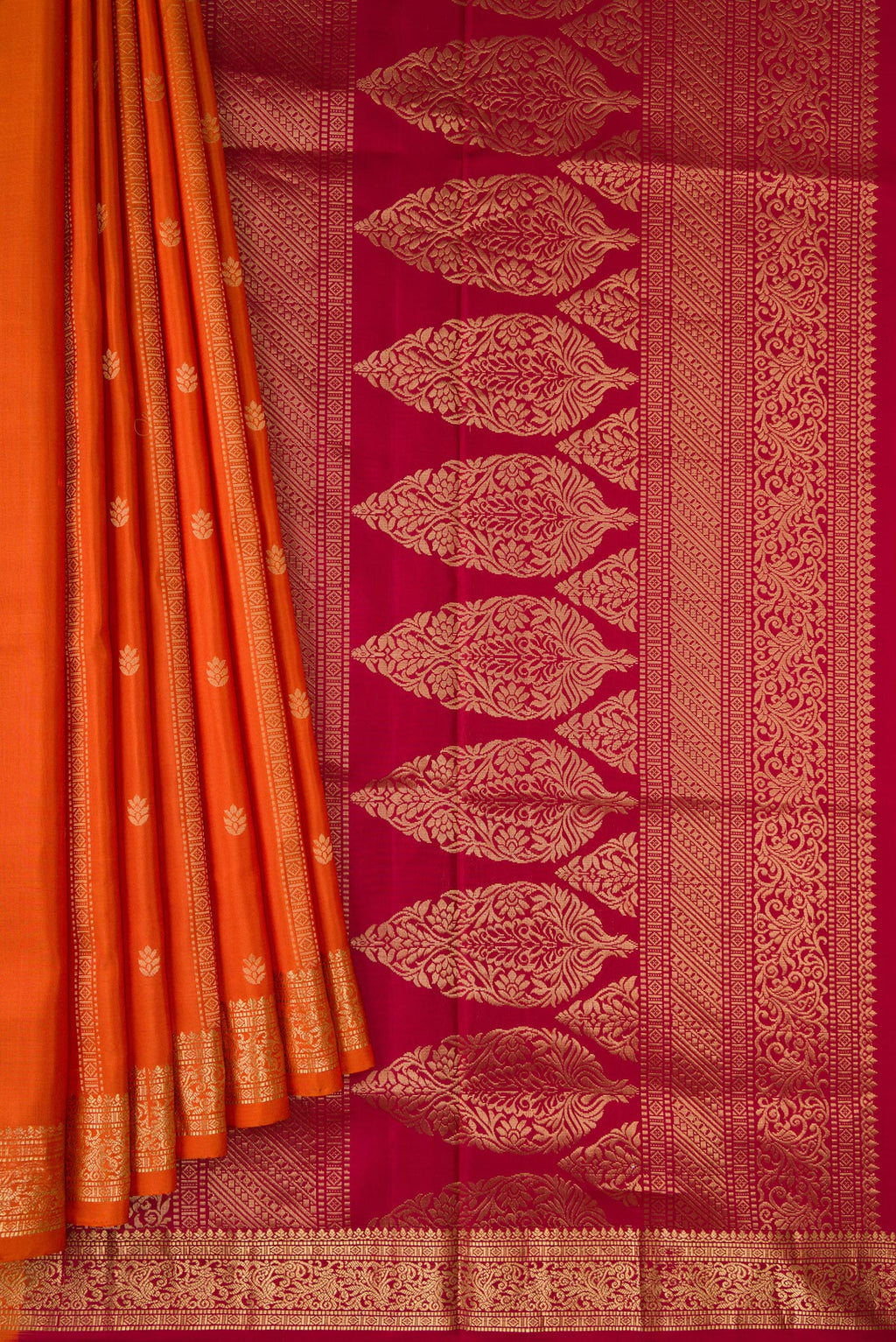 Pleats and pallu of Brick Orange Dual Tone Soft Silk Saree with Stripes on the body and Zari Border. 