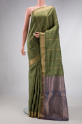 Mehandi Green Dual Tone Soft Silk Saree with Zari Butta on the body and Zari Border.  displayed on a mannequin