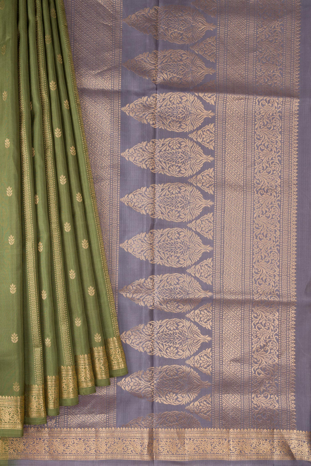 Pleats and pallu of Mehandi Green Dual Tone Soft Silk Saree with Zari Butta on the body and Zari Border. 