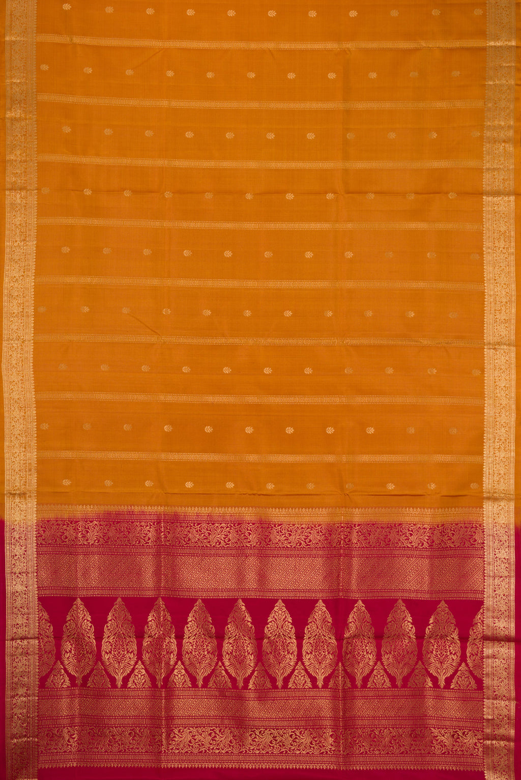 Flat view of Mustard Dual Tone Soft Silk Saree with Zari Butta on the body and Zari Border. 